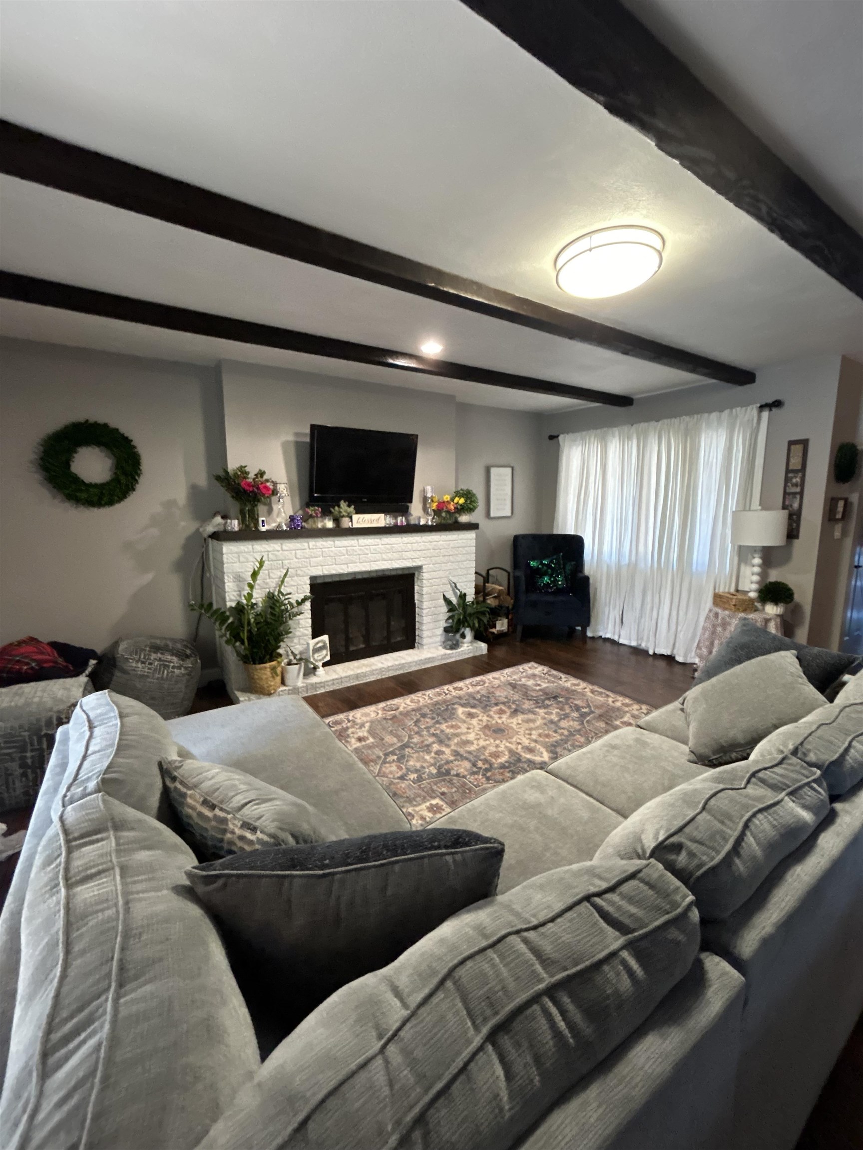 4563 Sunderman Road Rockford, IL 61114 - Photo 5 of 70 a living room with furniture and a fireplace