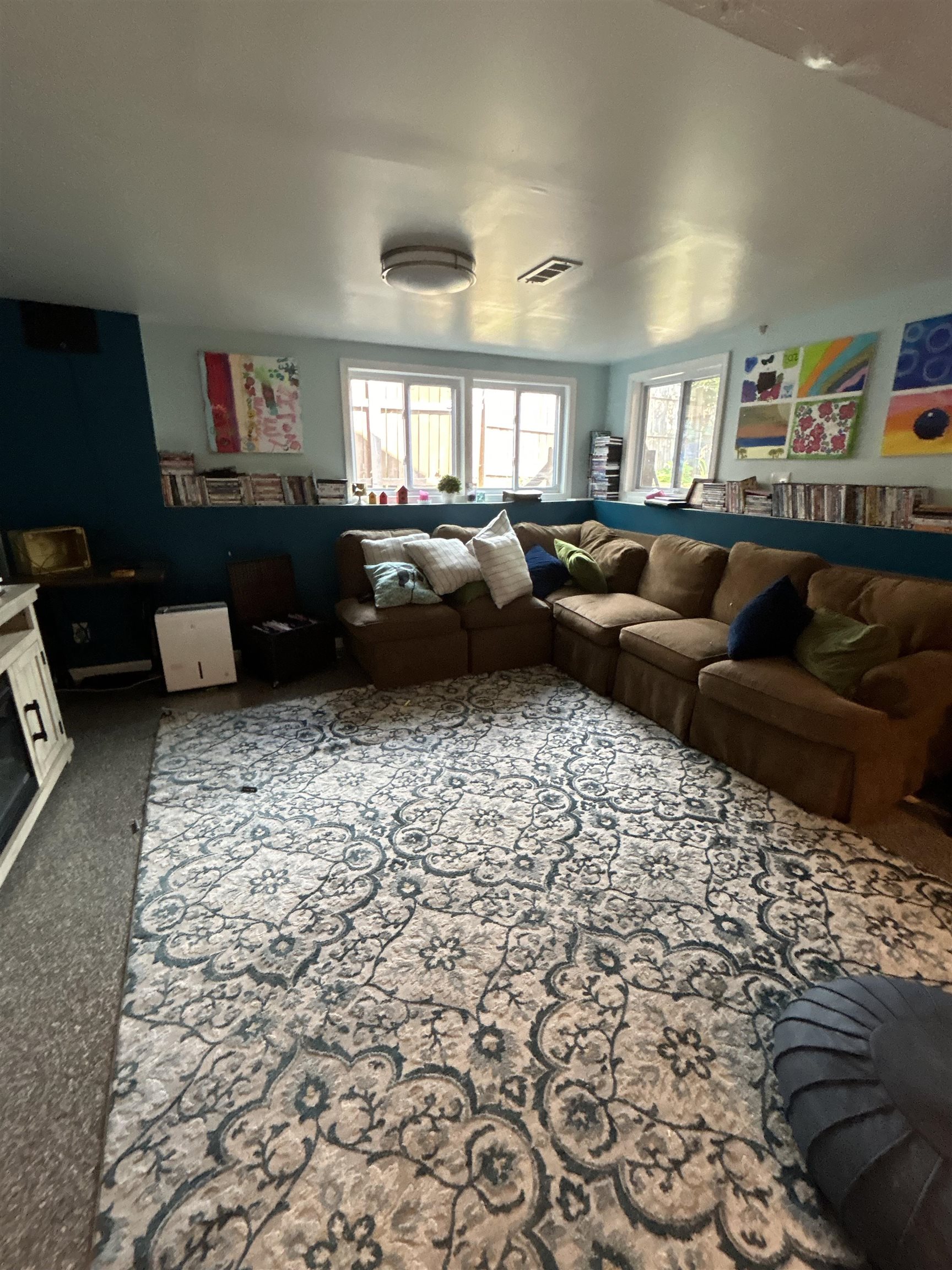4563 Sunderman Road Rockford, IL 61114 - Photo 51 of 70 a living room with furniture and a flat screen tv