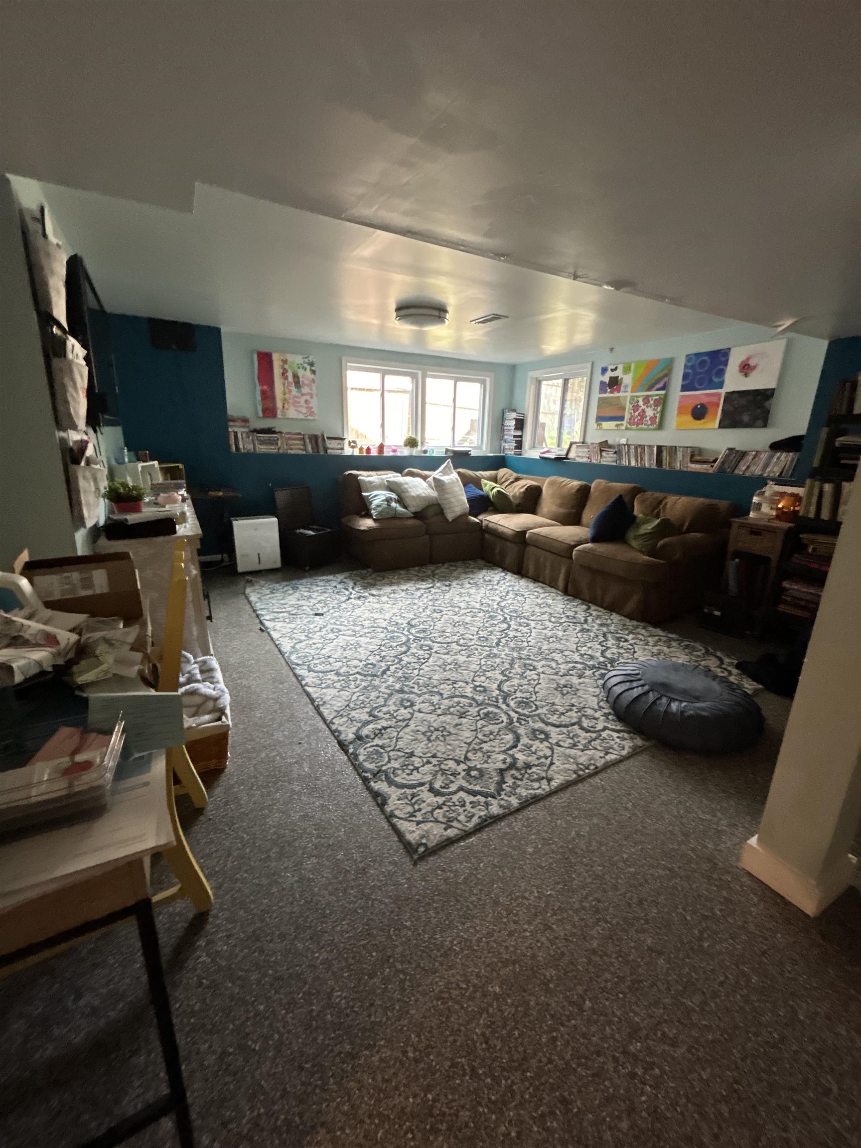 4563 Sunderman Road Rockford, IL 61114 - Photo 53 of 70 a living room with lots of furniture and a flat screen tv