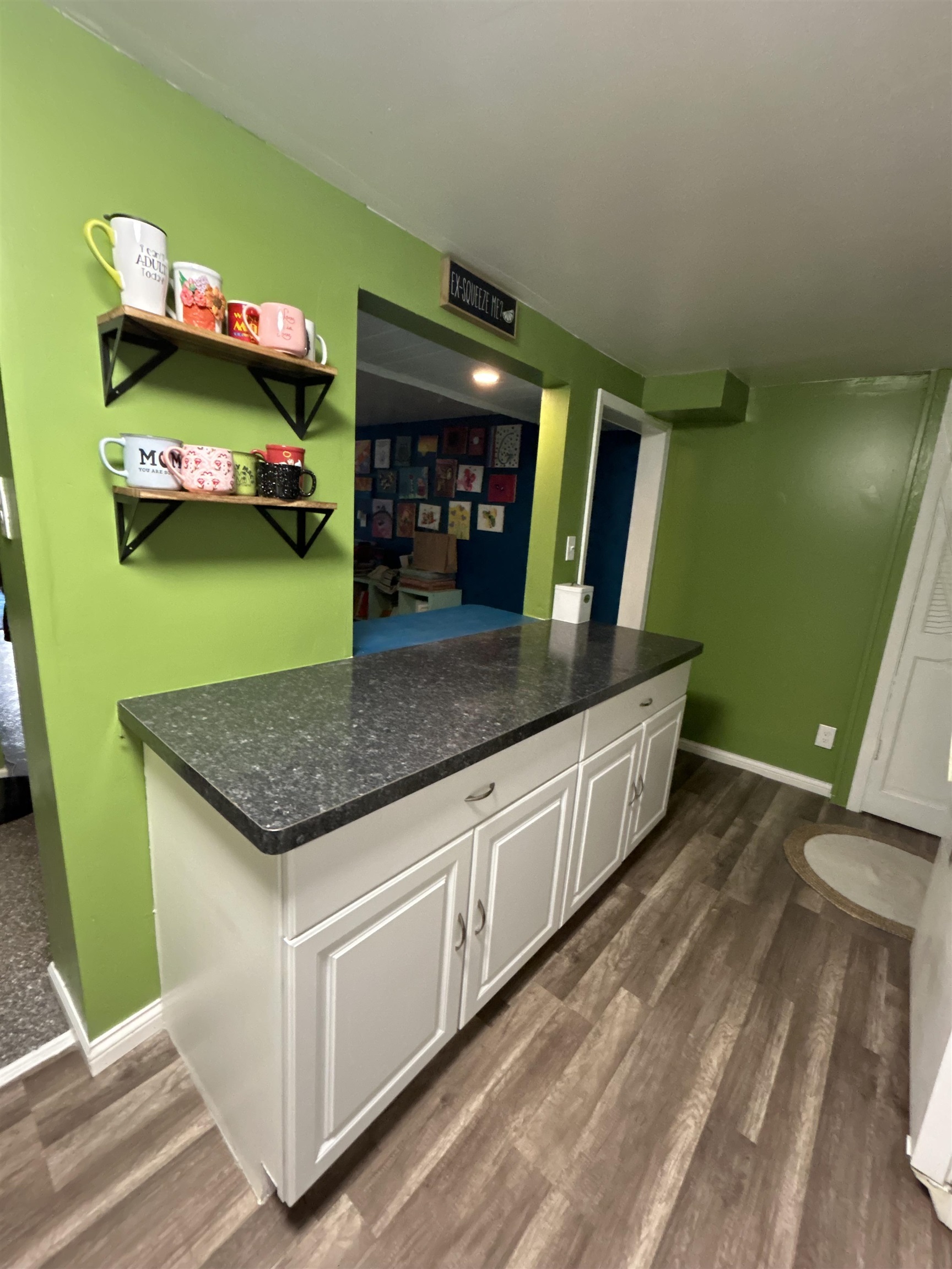 4563 Sunderman Road Rockford, IL 61114 - Photo 58 of 70 a kitchen with stainless steel appliances granite countertop a sink and a microwave