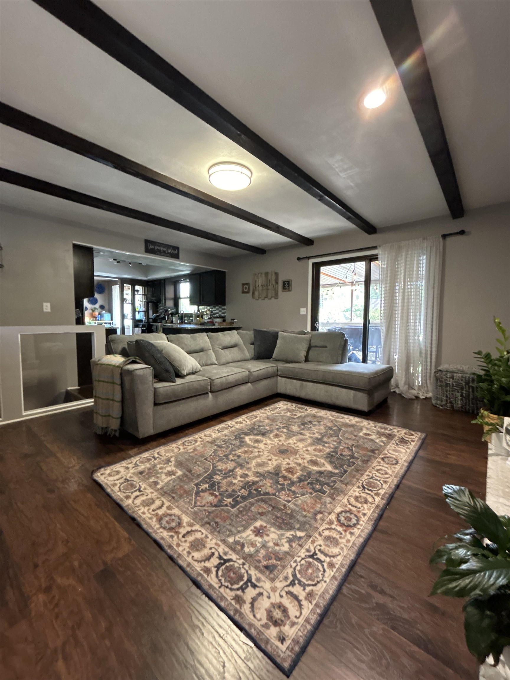 4563 Sunderman Road Rockford, IL 61114 - Photo 8 of 70 a living room with large couches and a rug