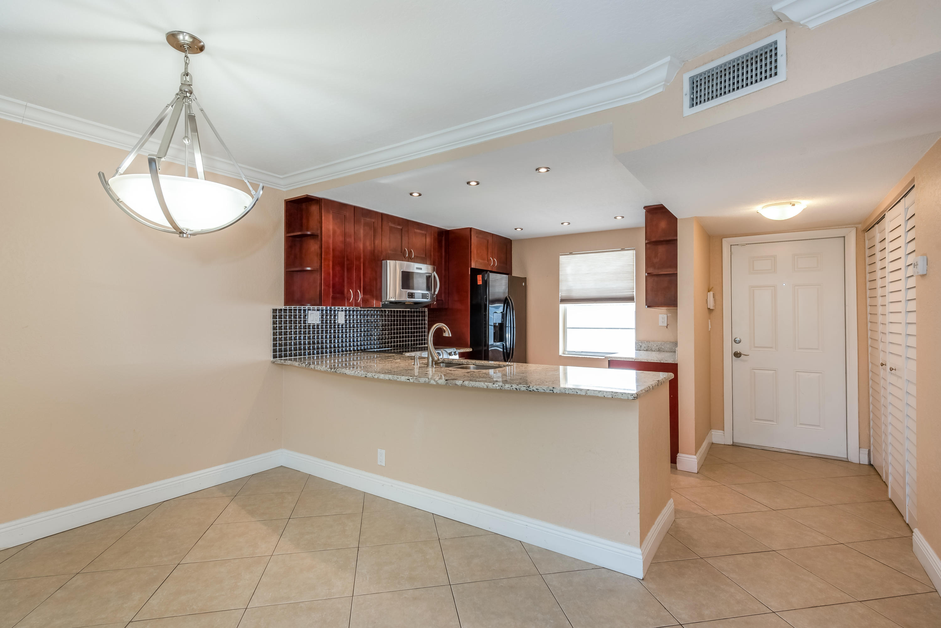 9210 Southwest 3rd Street, Unit 203 Boca Raton, FL 33428 - Photo 4 of 27 Bar Seating Available