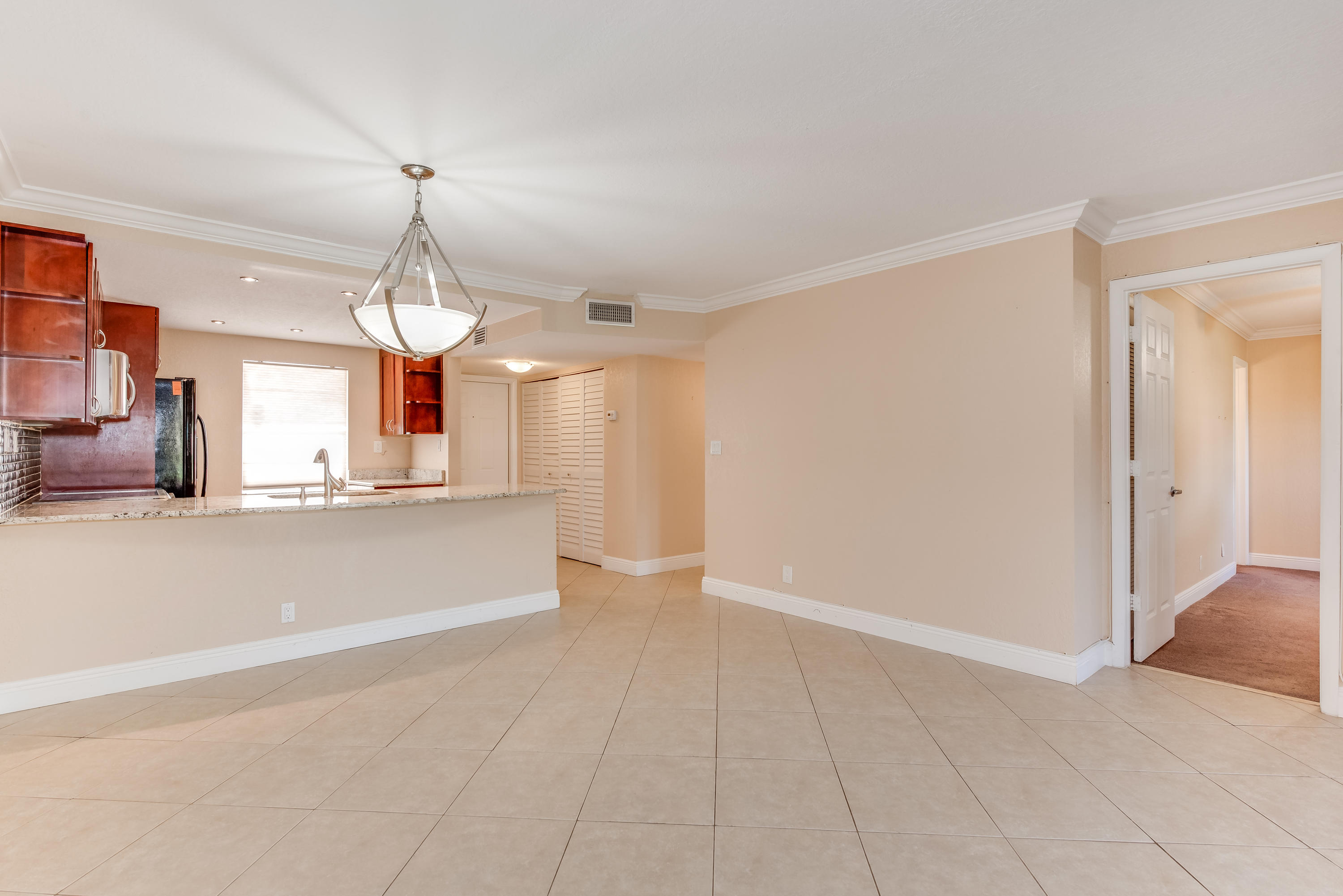 9210 Southwest 3rd Street, Unit 203 Boca Raton, FL 33428 - Photo 9 of 27 Dining/Living