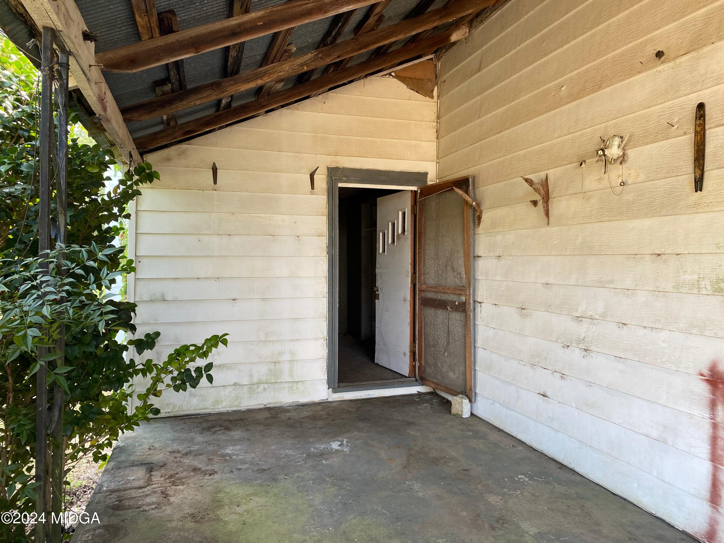 491 Barrow Road Reynolds, GA 31076 - Photo 41 of 56 a view of a door of the house