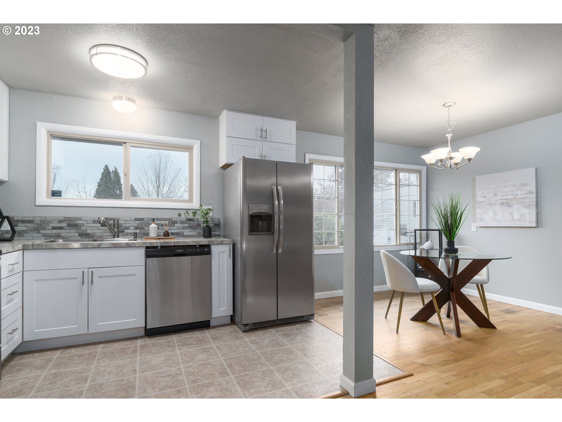 1730 Market Street Springfield, OR 97477 - Photo 11 of 43 a kitchen with stainless steel appliances granite countertop a refrigerator and a sink