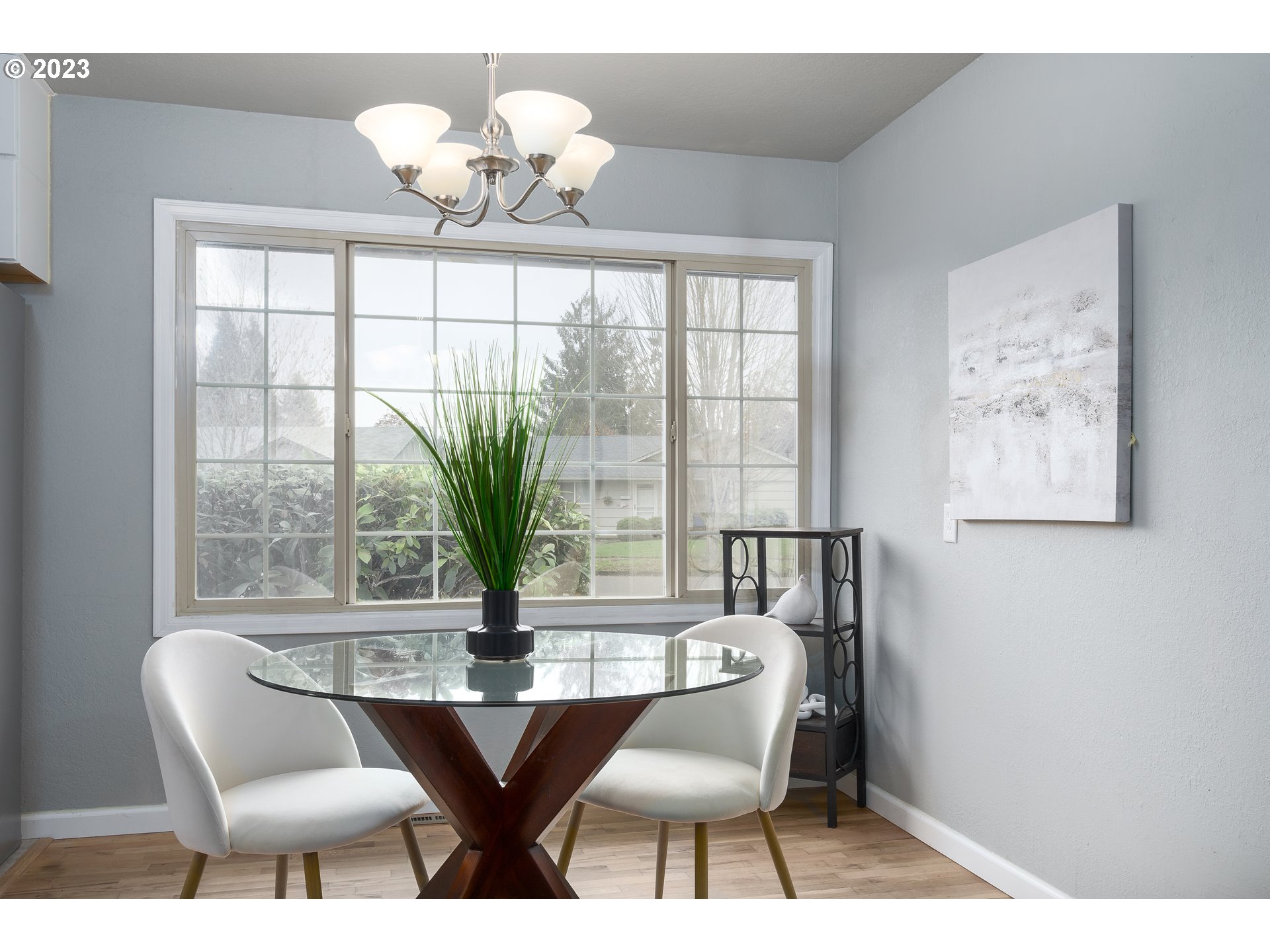 1730 Market Street Springfield, OR 97477 - Photo 12 of 43 a view of a dining room with furniture wooden floor and chandelier