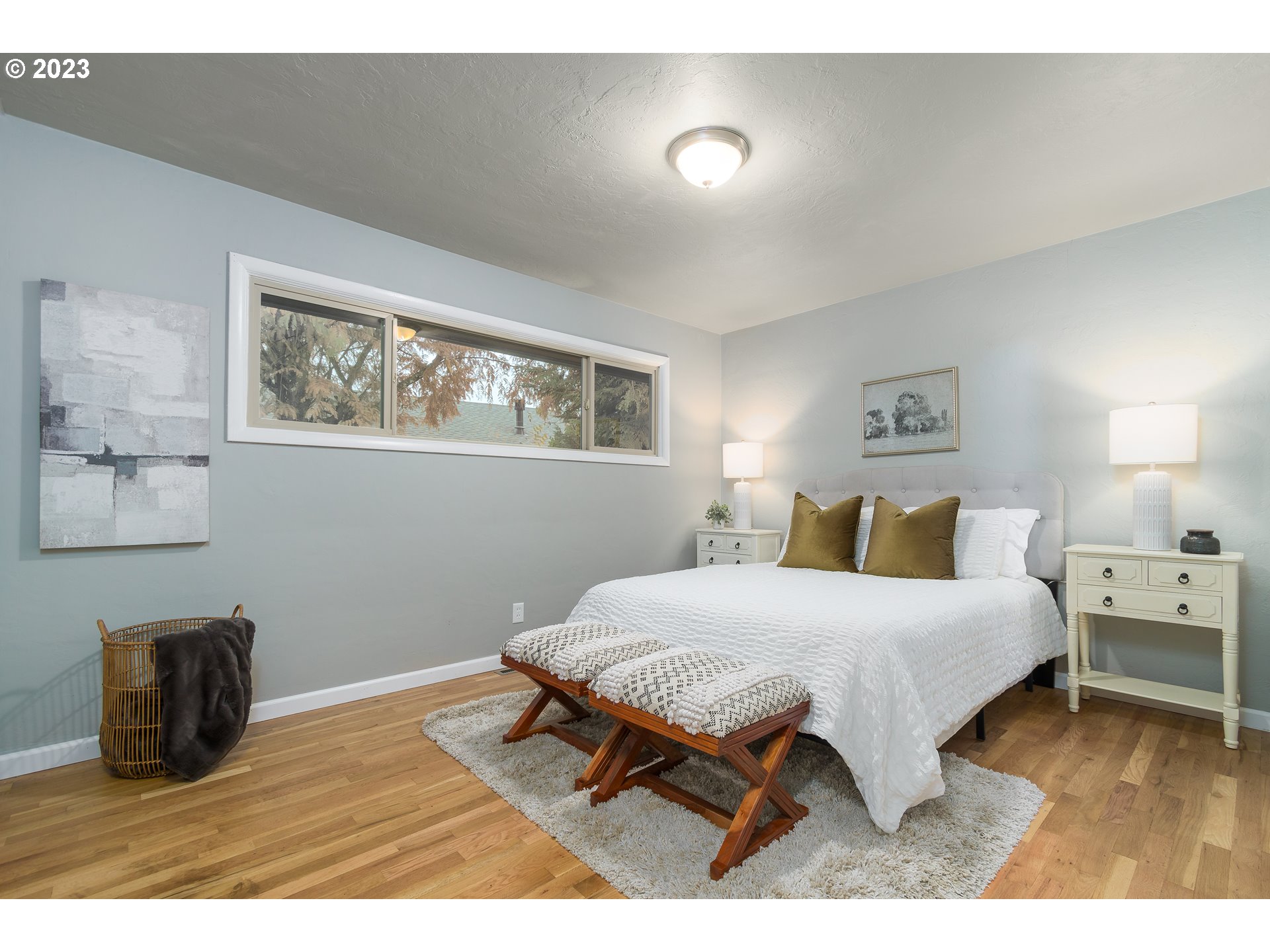 1730 Market Street Springfield, OR 97477 - Photo 15 of 43 a bedroom with a bed and a table