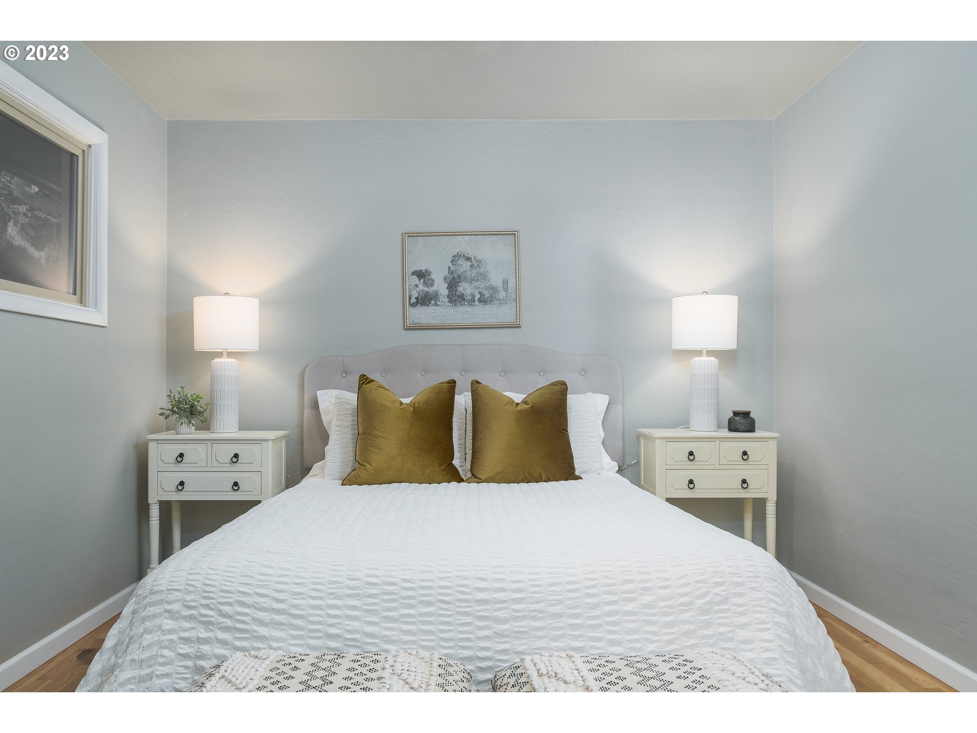 1730 Market Street Springfield, OR 97477 - Photo 16 of 43 a bedroom with a bed and a lamp on dresser