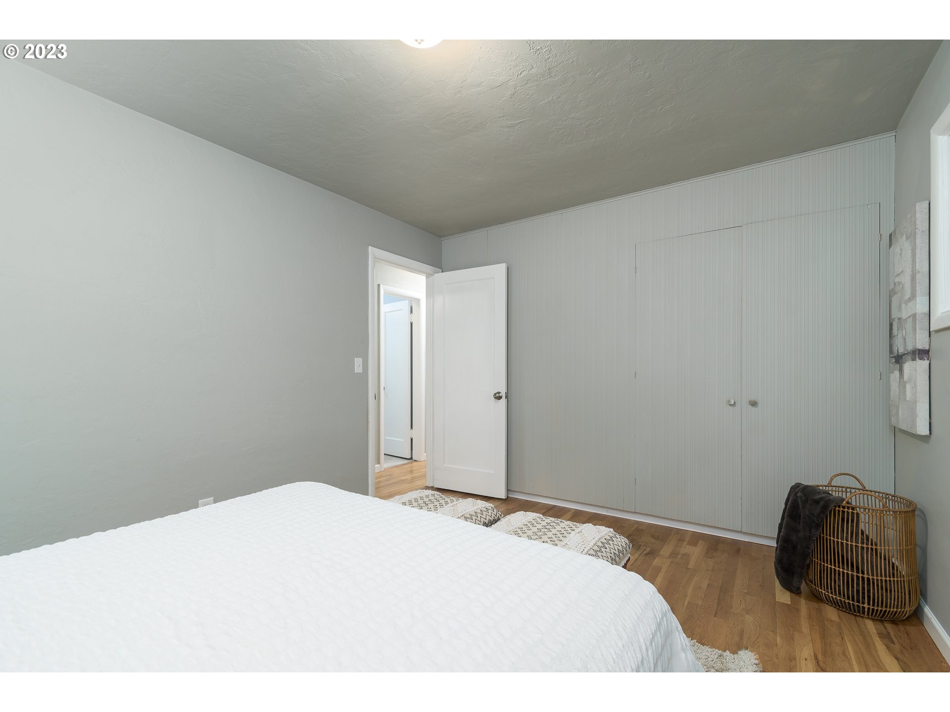 1730 Market Street Springfield, OR 97477 - Photo 17 of 43 a bedroom with a bed and a chair