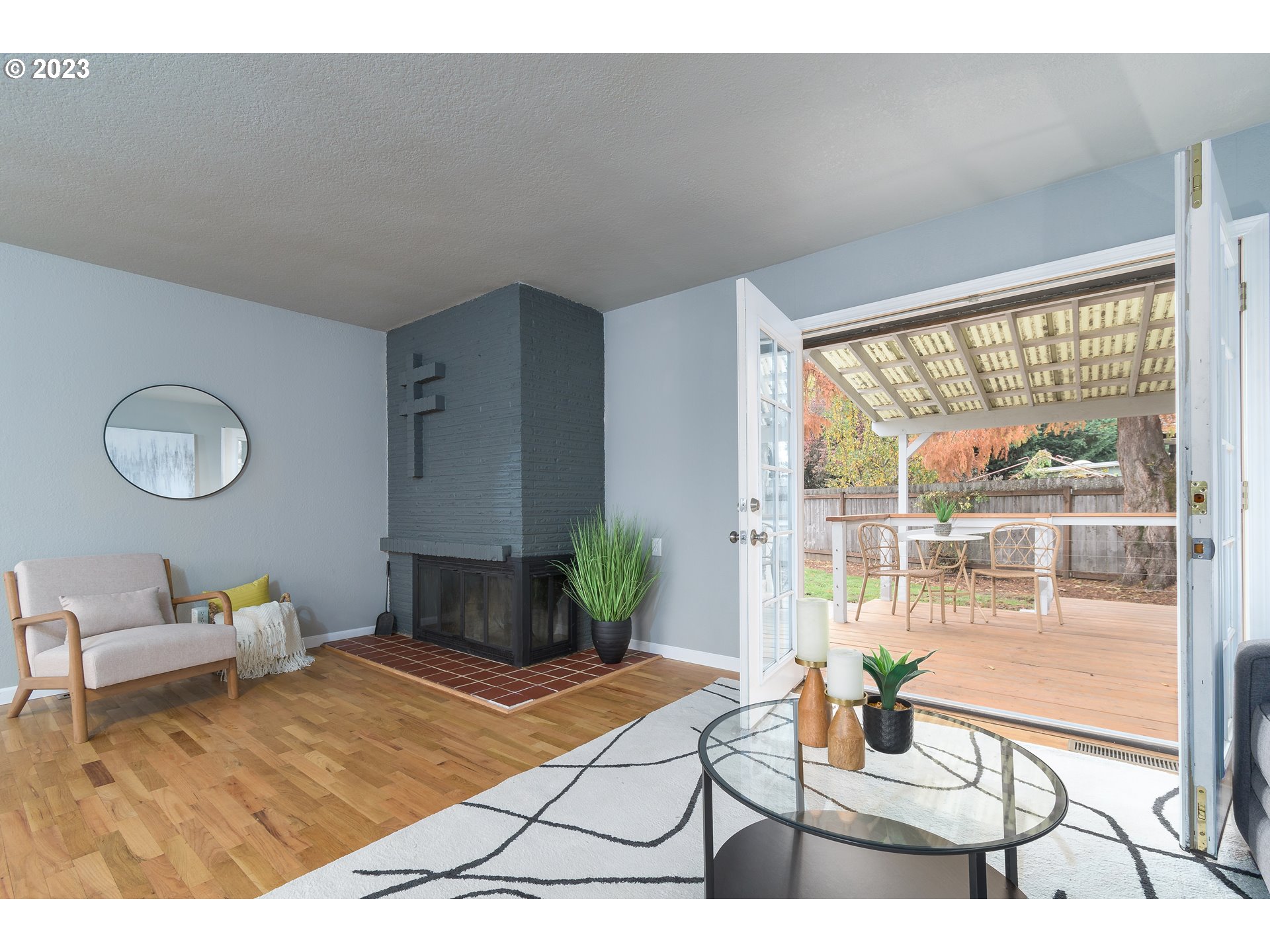 1730 Market Street Springfield, OR 97477 - Photo 24 of 43 a living room with furniture and a floor to ceiling window