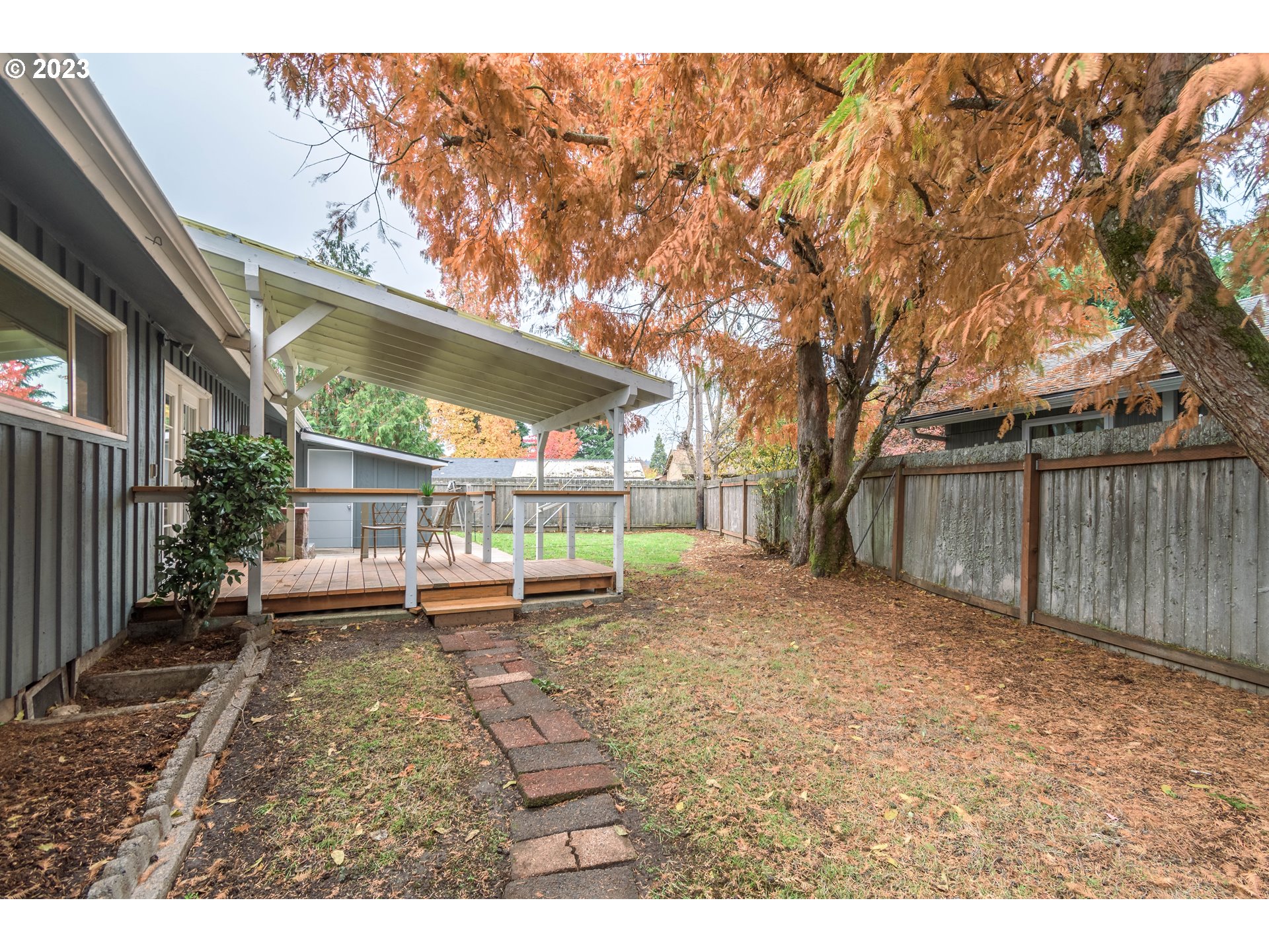 1730 Market Street Springfield, OR 97477 - Photo 30 of 43 a backyard of a house with barbeque oven table and chairs