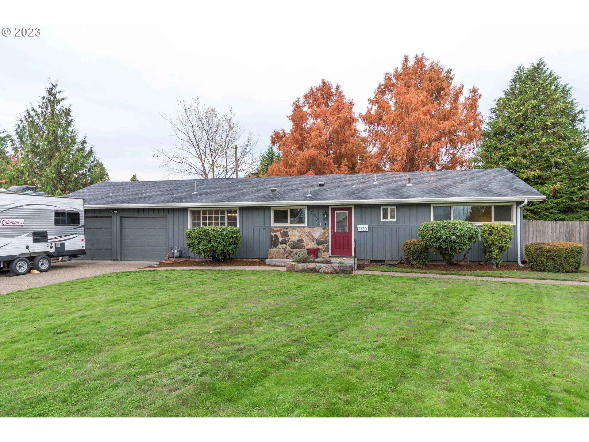 1730 Market Street Springfield, OR 97477 - Photo 39 of 43 a front view of house with a garden and trees