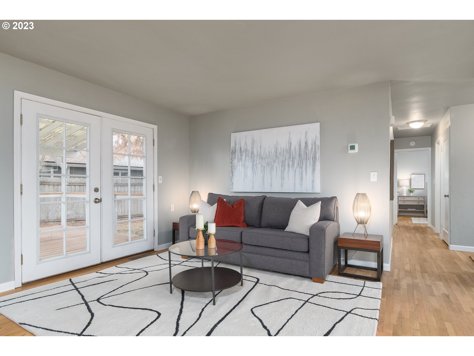 1730 Market Street Springfield, OR 97477 - Photo 5 of 43 a living room with furniture a rug and a large window