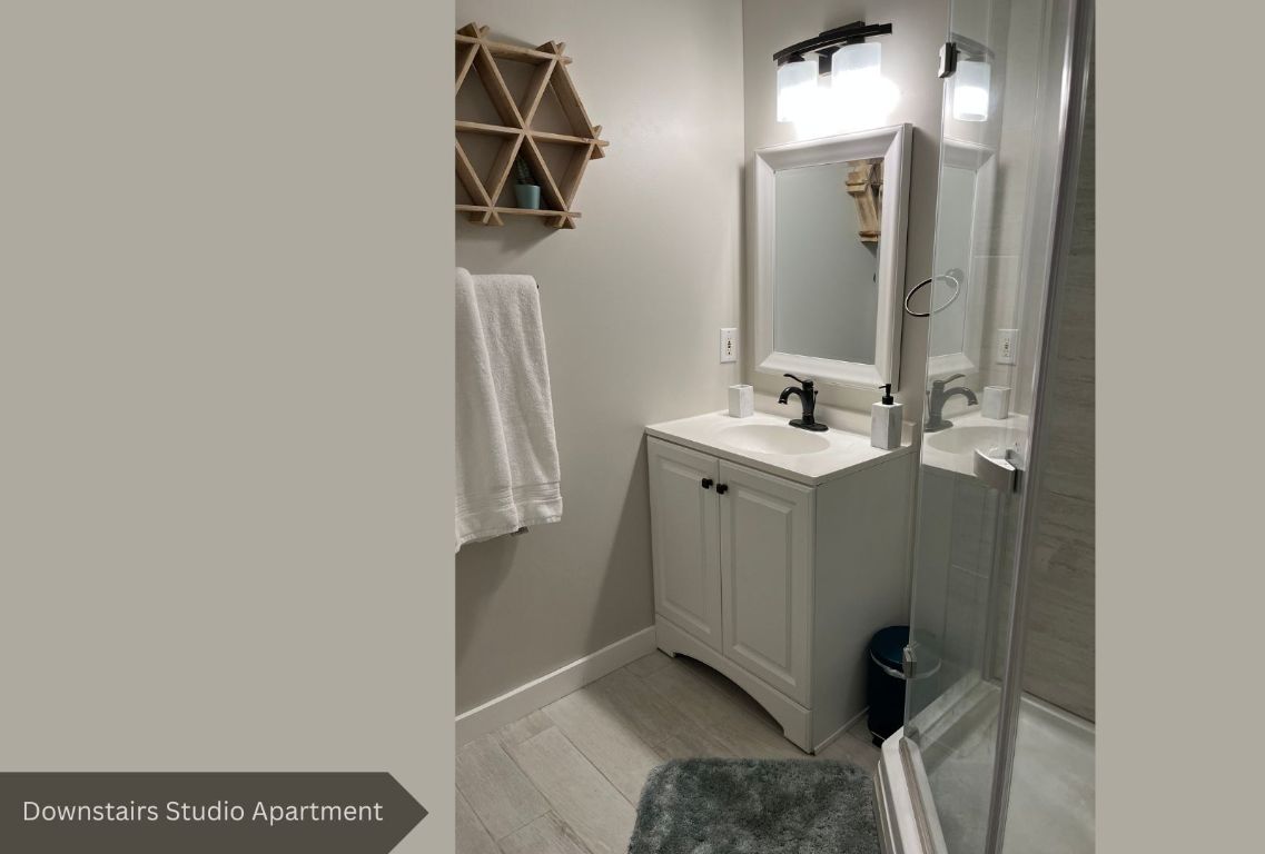 0 Rabb Road Austin, TX 78704 - Photo 26 of 39 a bathroom with a sink and mirror