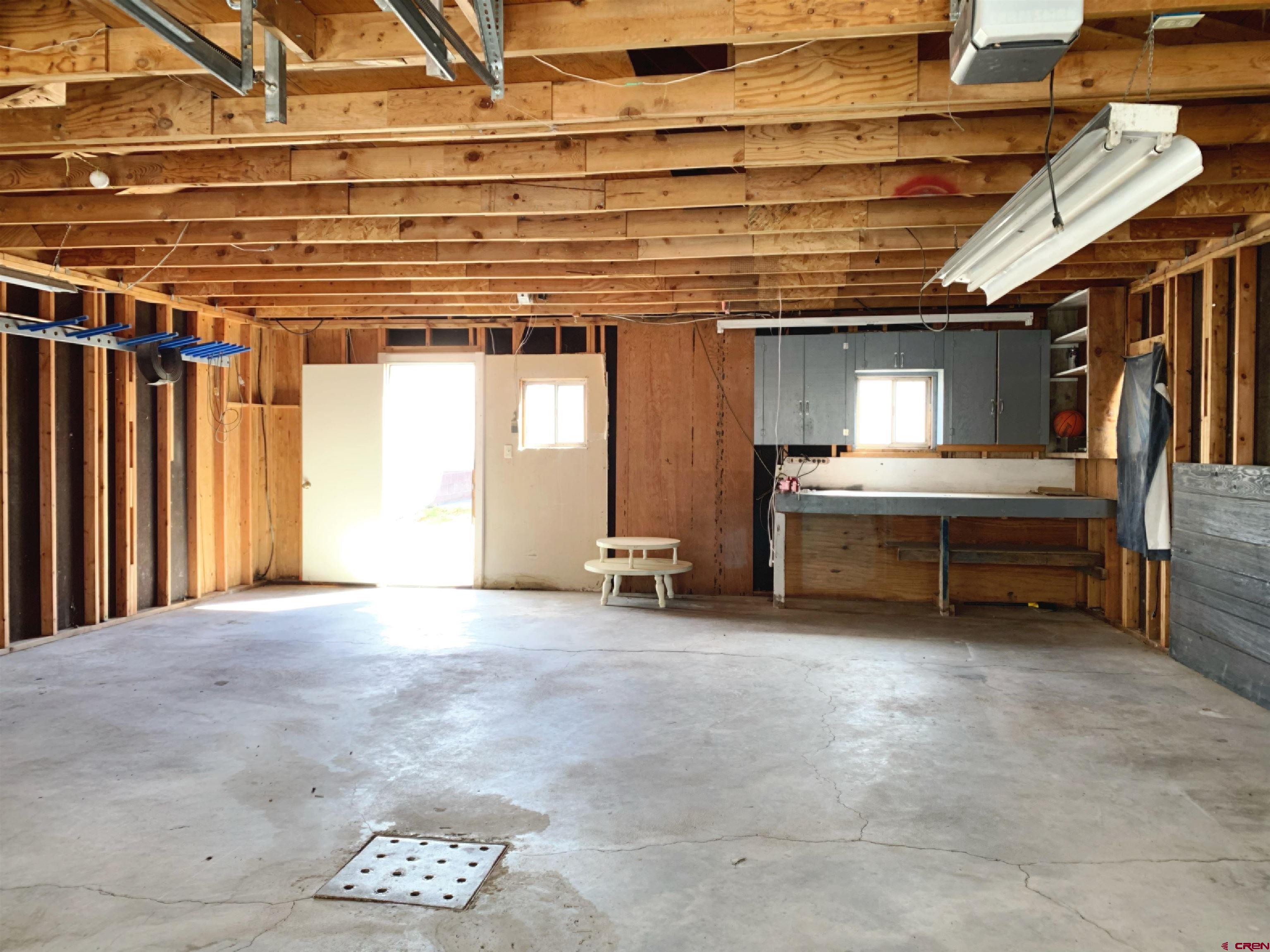 331 Morris Street Monte Vista, CO 81144 - Photo 14 of 31 a view of an empty room with a fireplace
