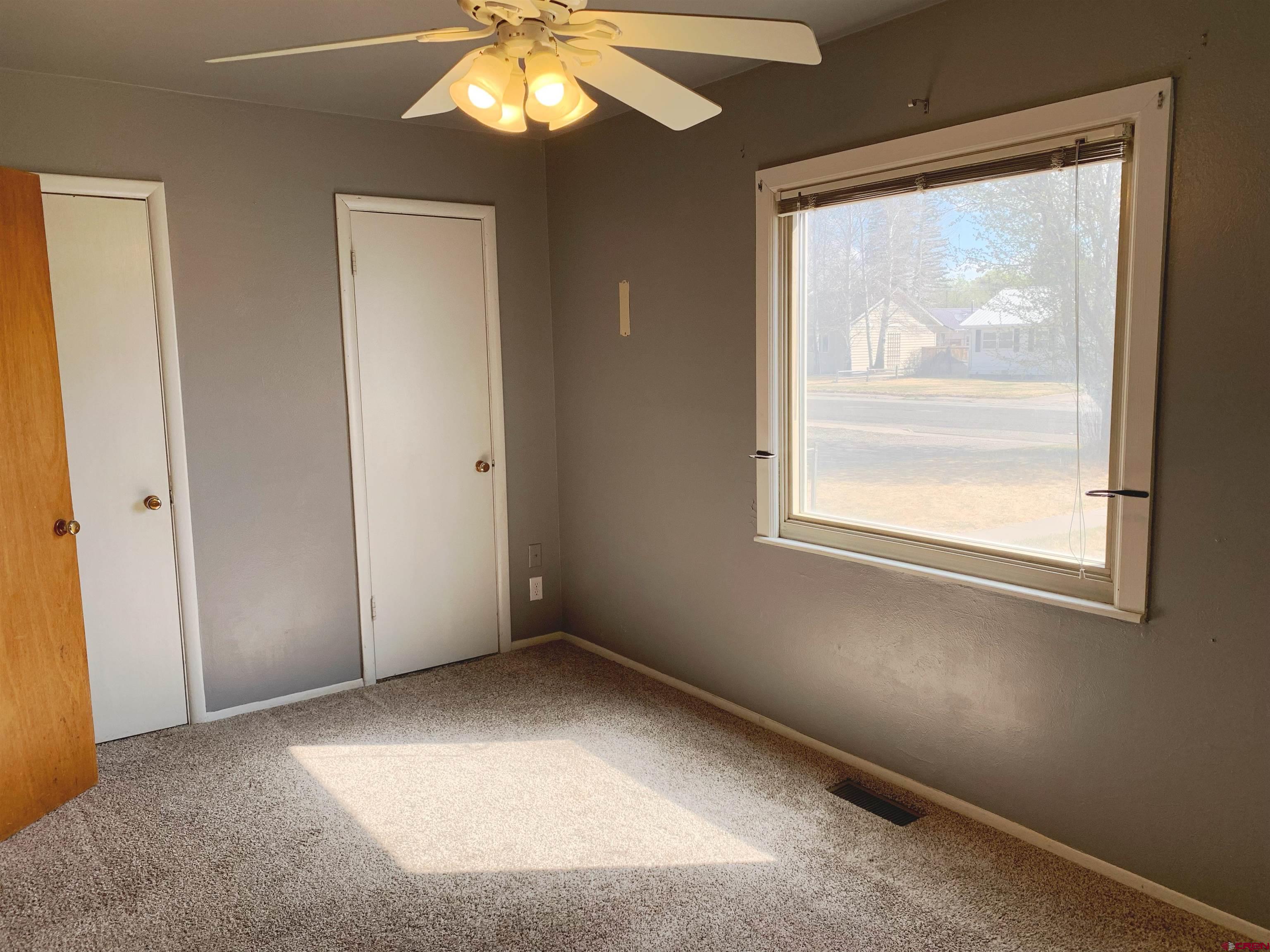 331 Morris Street Monte Vista, CO 81144 - Photo 19 of 31 an empty room with a window