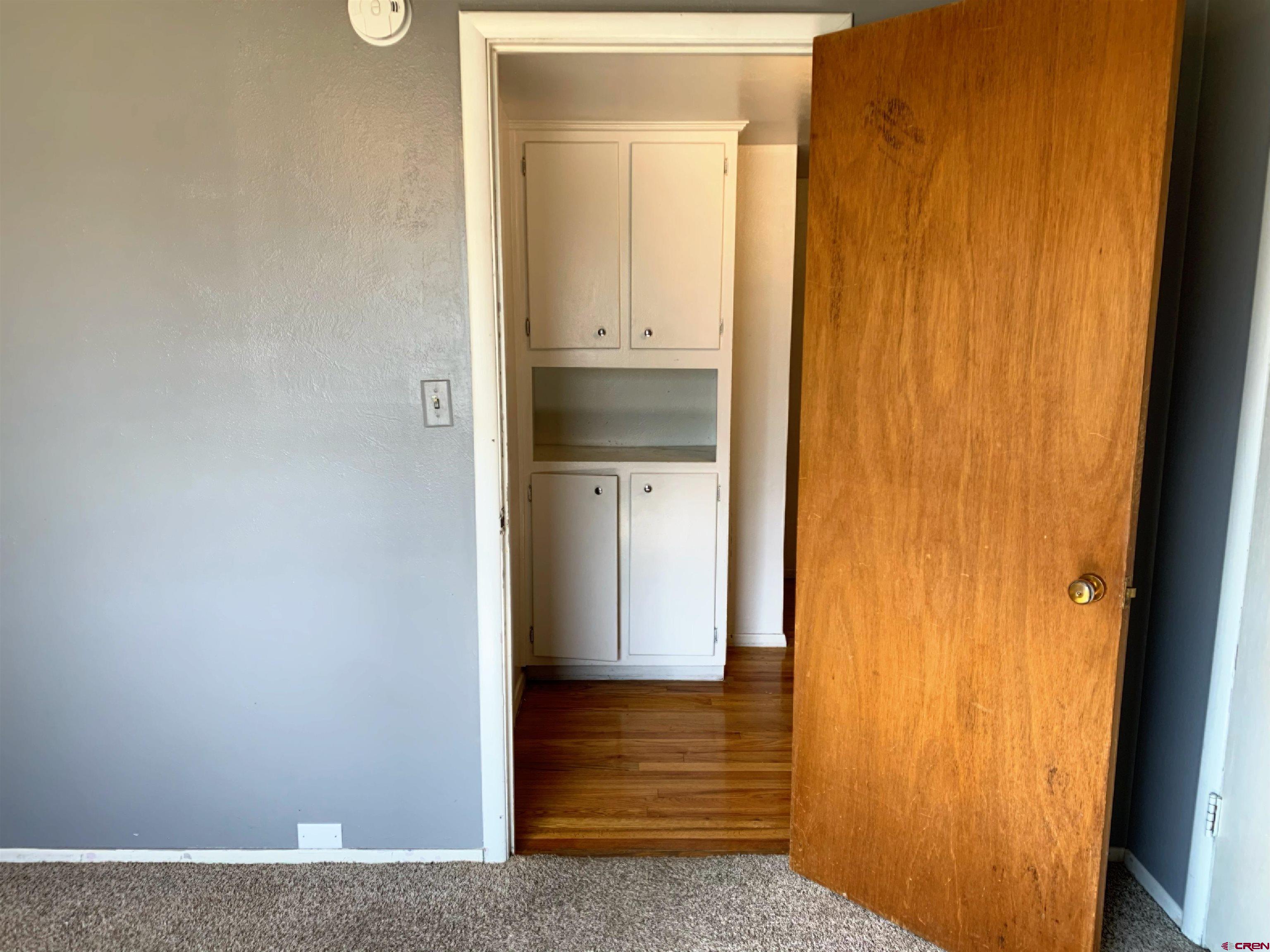 331 Morris Street Monte Vista, CO 81144 - Photo 20 of 31 a view of front door with a sink and mirror