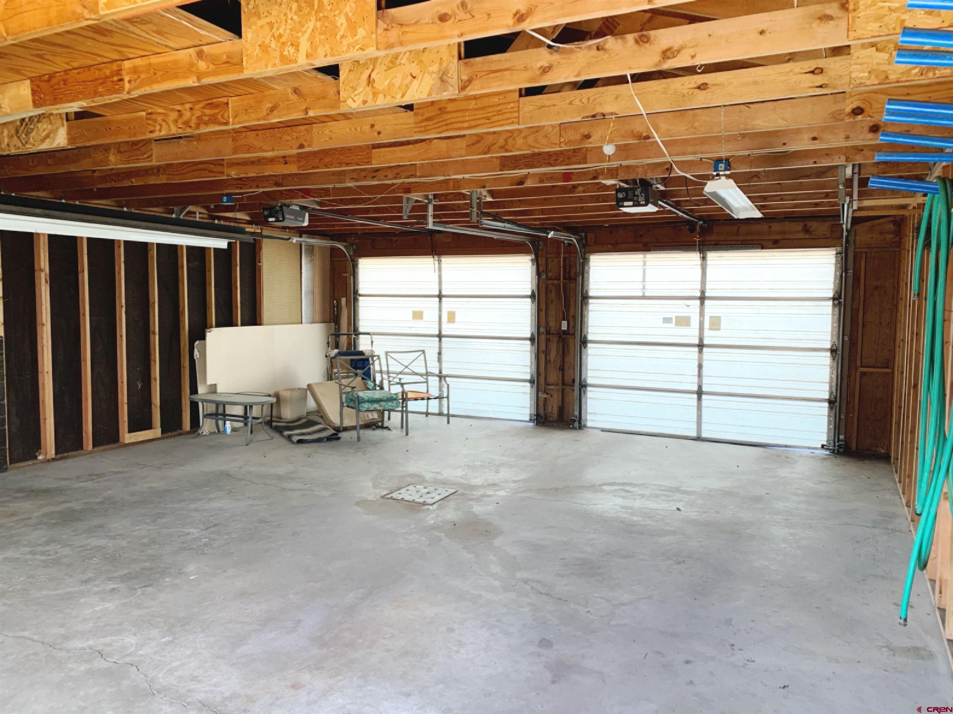 331 Morris Street Monte Vista, CO 81144 - Photo 26 of 31 a view of a garage with furniture