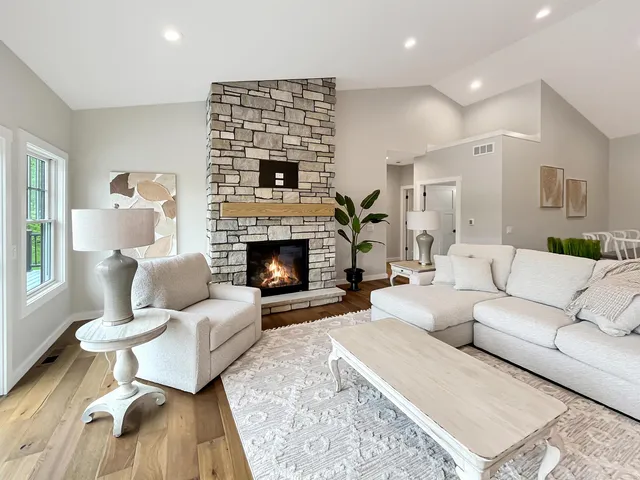 a view of a house with backyard and deck
