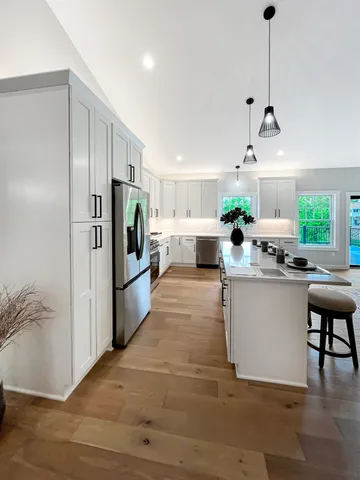 a view of a lake with a yard