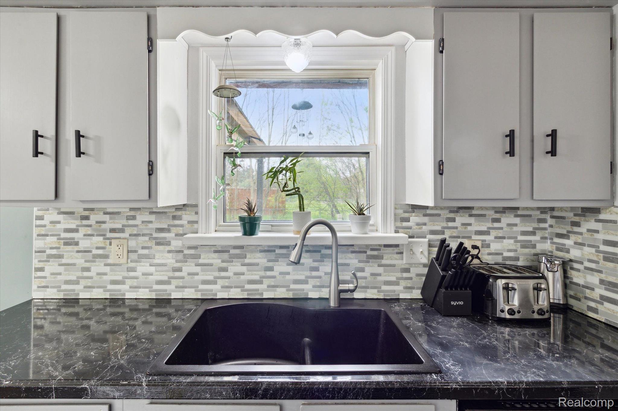 1308 Rae Street Mount Morris, MI 48458 - Photo 12 of 33 Stylish tile backsplash