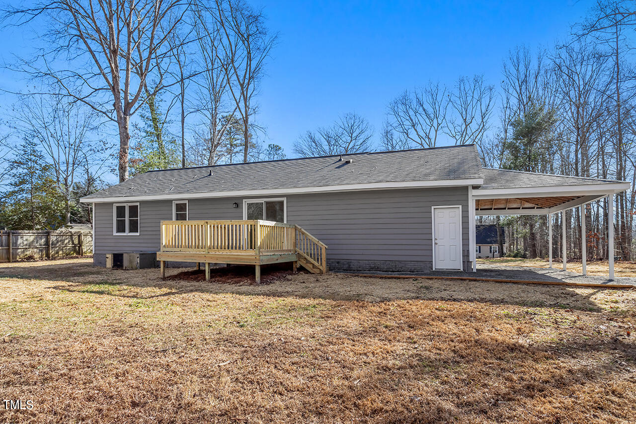 5137 Shield Circle Raleigh, NC 27603 - Photo 23 of 36 a house that has a tree in front of it
