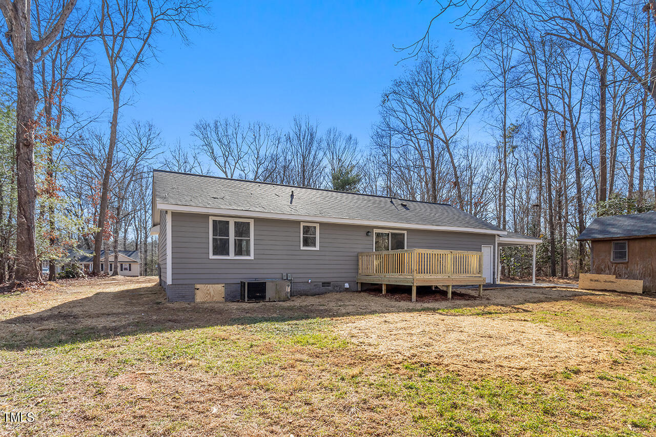 5137 Shield Circle Raleigh, NC 27603 - Photo 28 of 36 a front view of a house with a yard