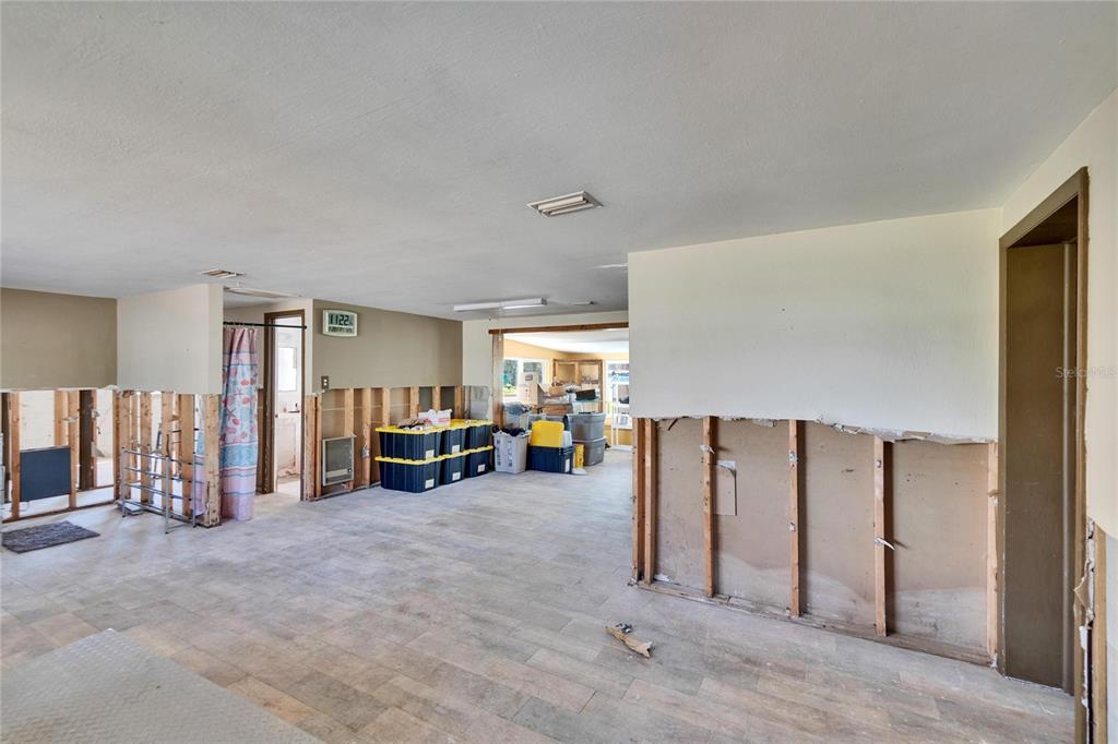 1019 Canal Street Ruskin, FL 33570 - Photo 15 of 52 a view of a livingroom with furniture and an empty room