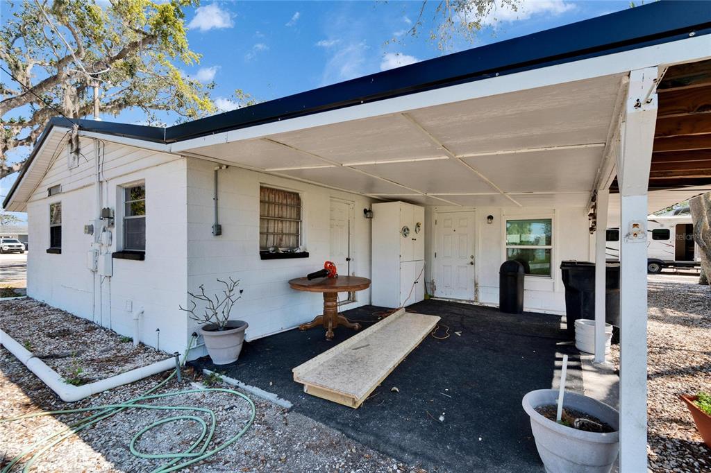 1019 Canal Street Ruskin, FL 33570 - Photo 20 of 52 a living room with furniture and a rug