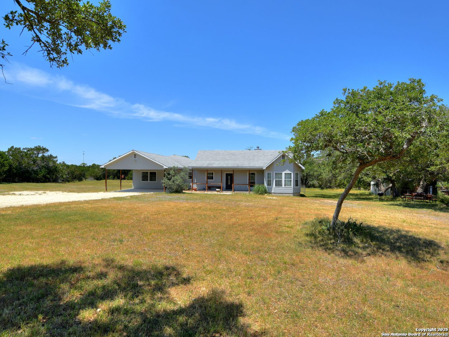725 Lonesome Loop Blanco, TX 78606 - Photo 2 of 26 a view of swimming pool and ocean view