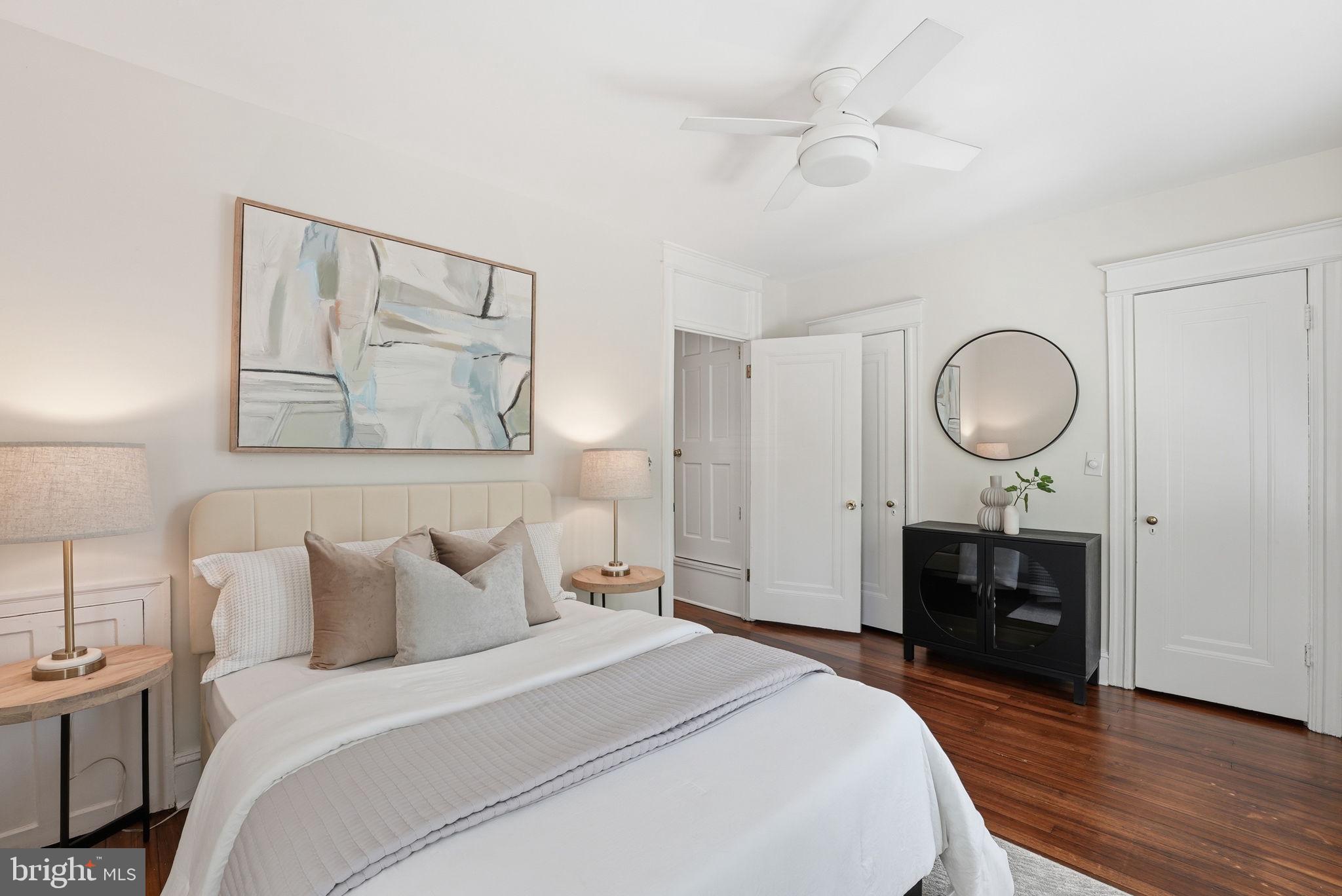 3512 30th Street Northwest Washington, DC 20008 - Photo 23 of 41 a bedroom with a bed and a chandelier