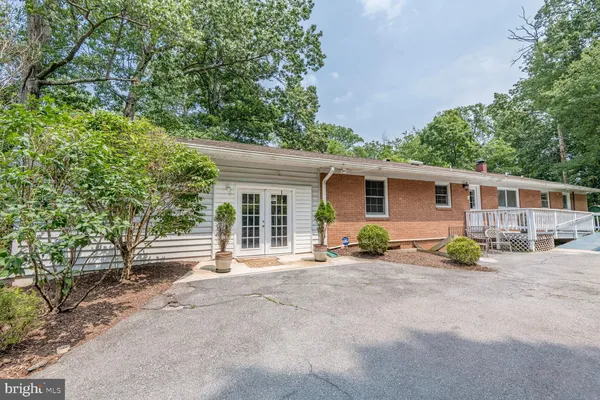 front view of a house with a patio