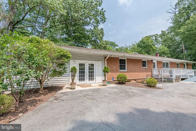 front view of a house with a patio