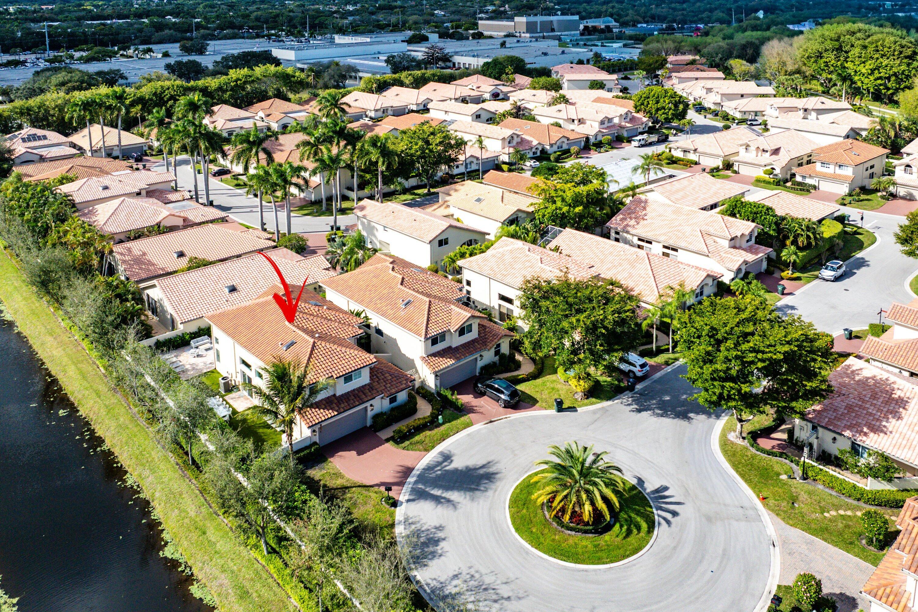 5183 Northwest 25th Way Boca Raton, FL 33496 - Photo 31 of 73 an aerial view of a house with a swimming pool yard and outdoor seating