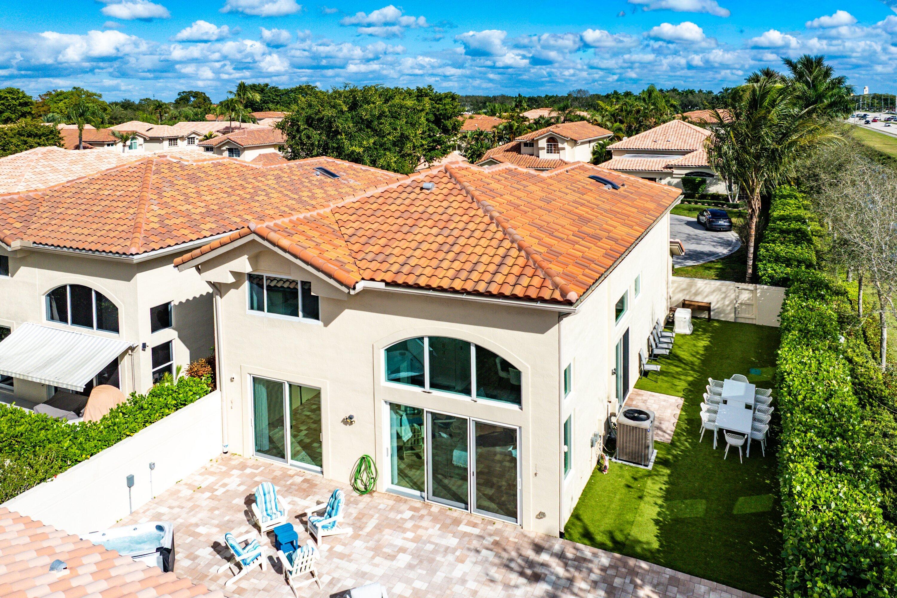 5183 Northwest 25th Way Boca Raton, FL 33496 - Photo 36 of 73 a aerial view of a house with a yard