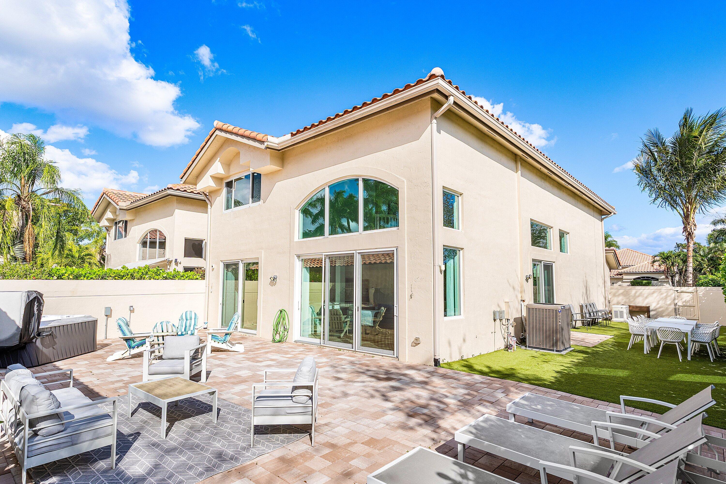 5183 Northwest 25th Way Boca Raton, FL 33496 - Photo 37 of 73 a view of a house with backyard and sitting area