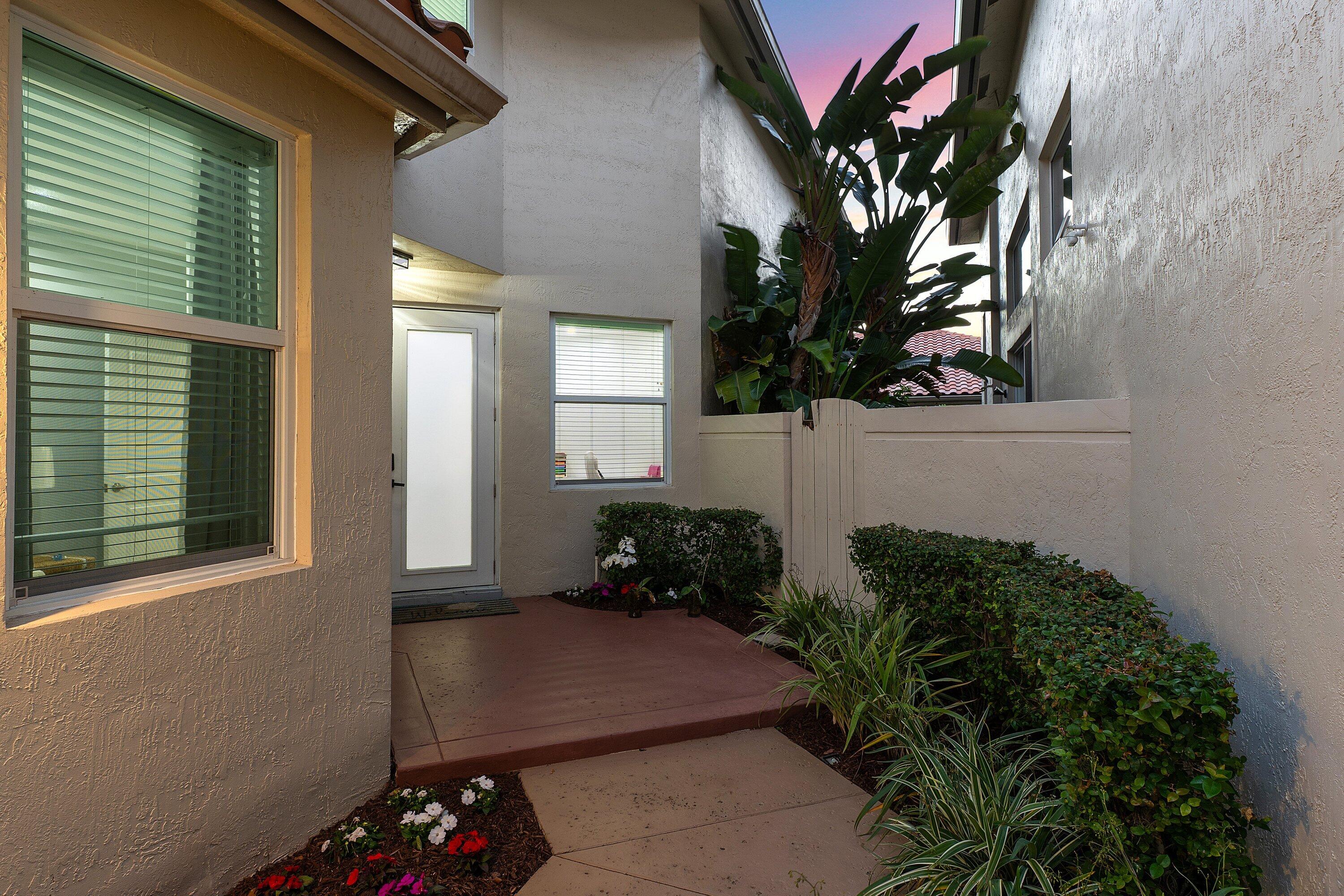 5183 Northwest 25th Way Boca Raton, FL 33496 - Photo 45 of 73 a backyard of a house with lots of green space