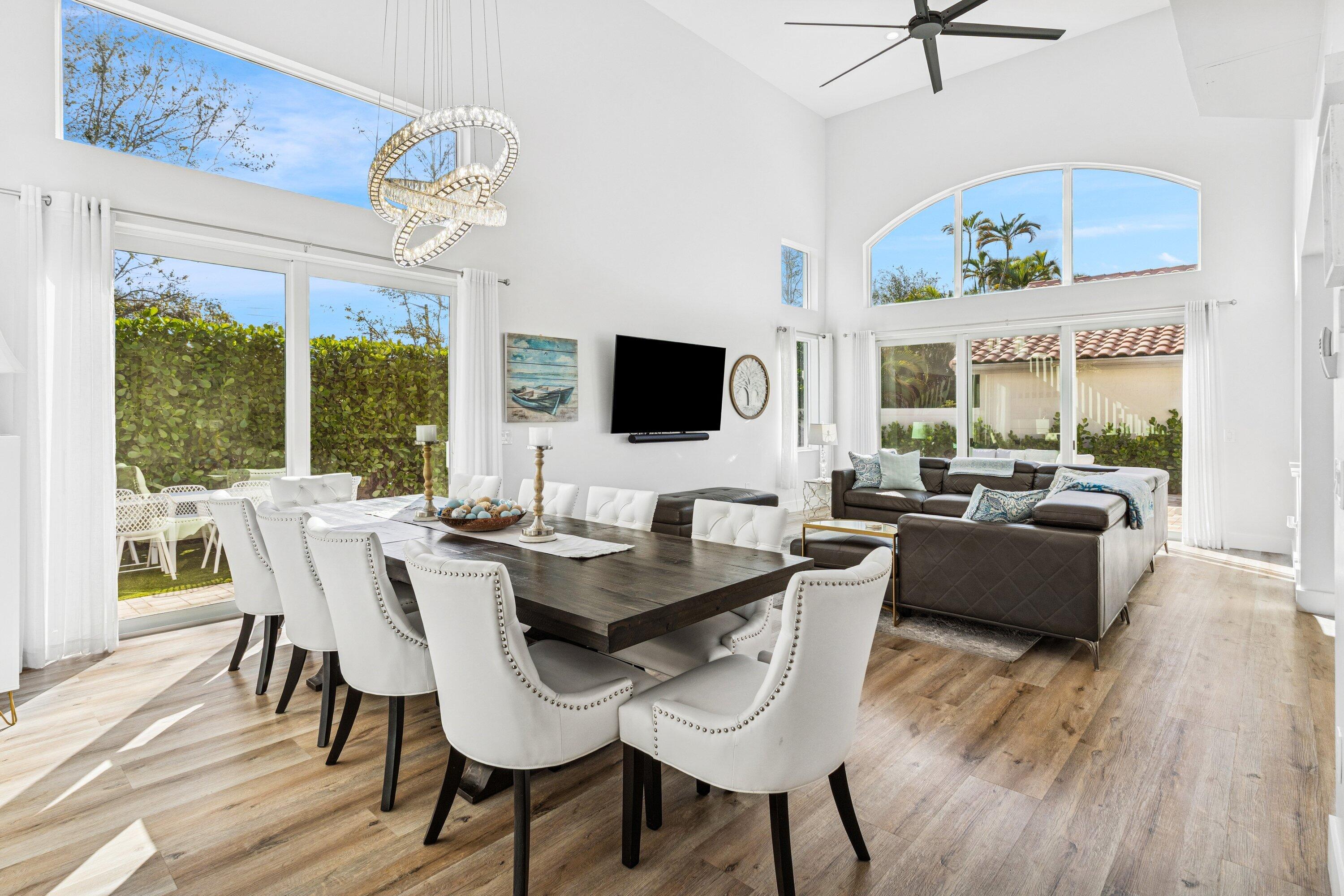 5183 Northwest 25th Way Boca Raton, FL 33496 - Photo 6 of 73 a view of a dining room with furniture window and wooden floor