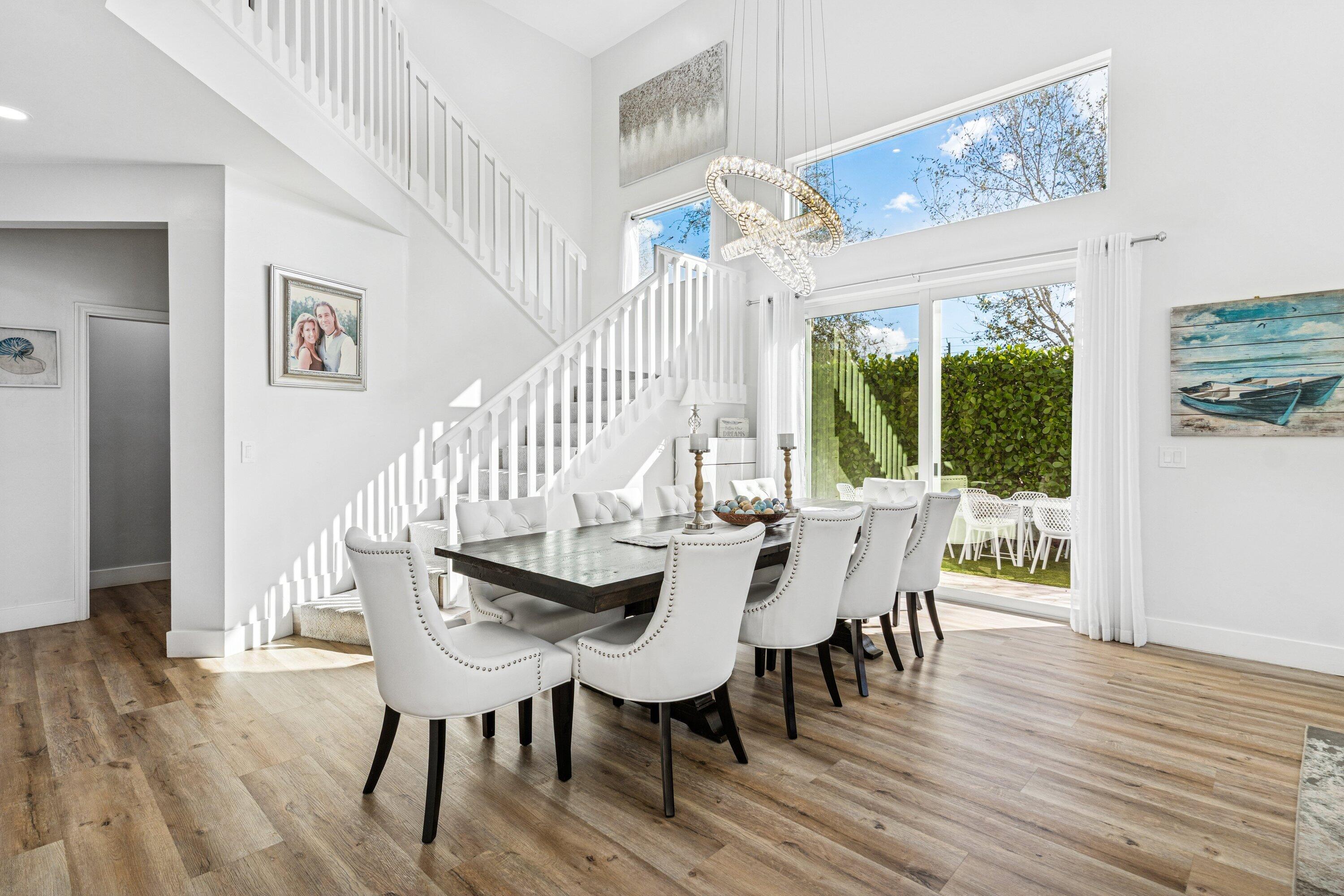 5183 Northwest 25th Way Boca Raton, FL 33496 - Photo 7 of 73 a view of a dining room with furniture window and wooden floor