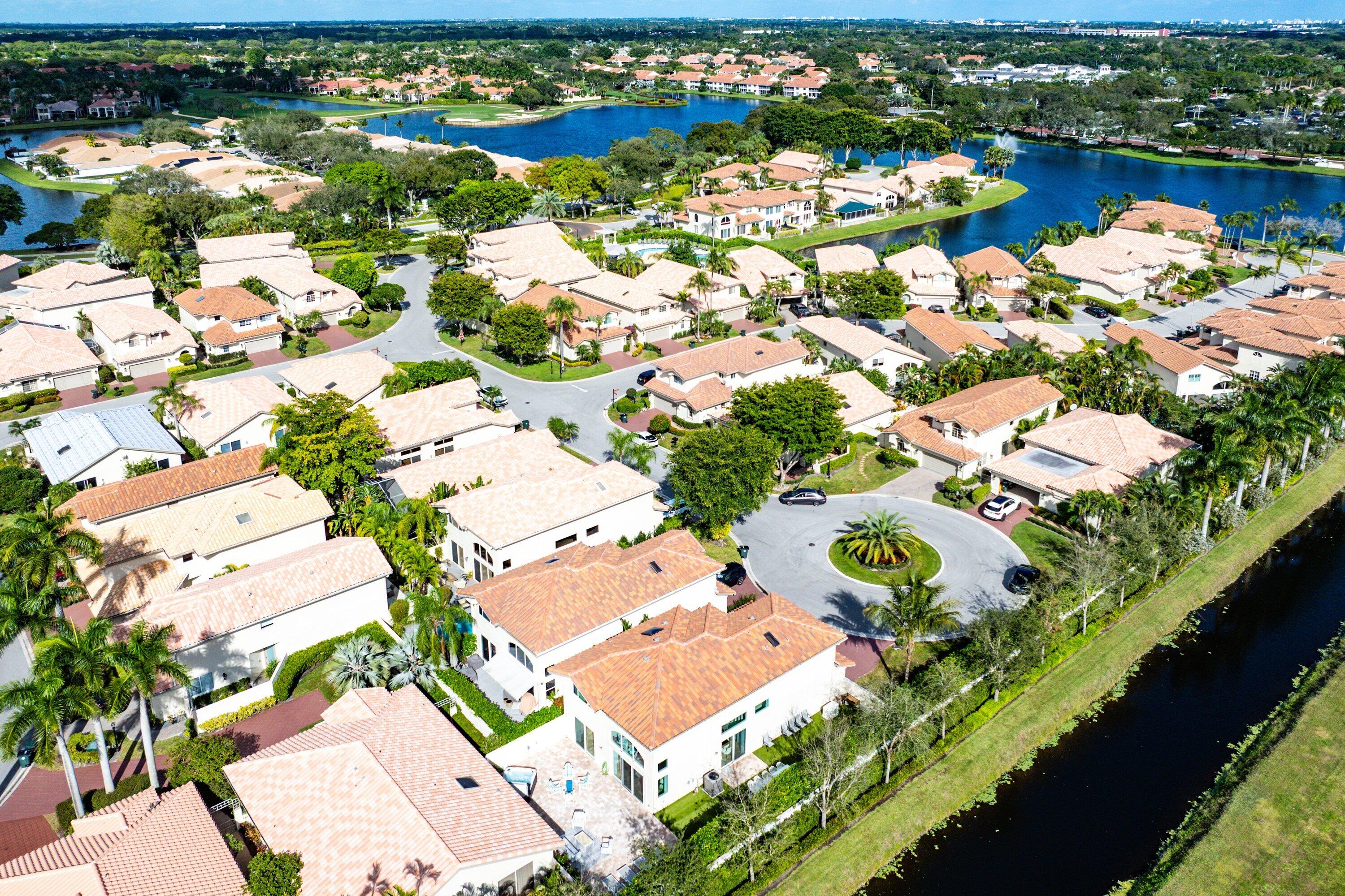 5183 Northwest 25th Way Boca Raton, FL 33496 - Photo 71 of 73 an aerial view of residential houses with outdoor space