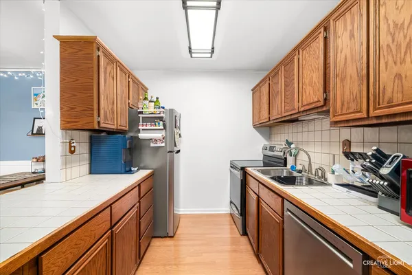 $170,000 | 1050 North Farnsworth Avenue, Unit 403, Aurora, IL 60505