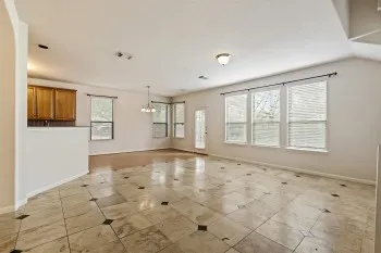 a view of an empty room and window