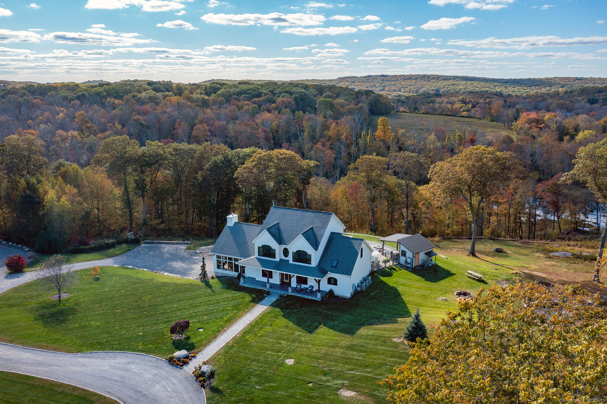 an aerial view of a house with a garden
