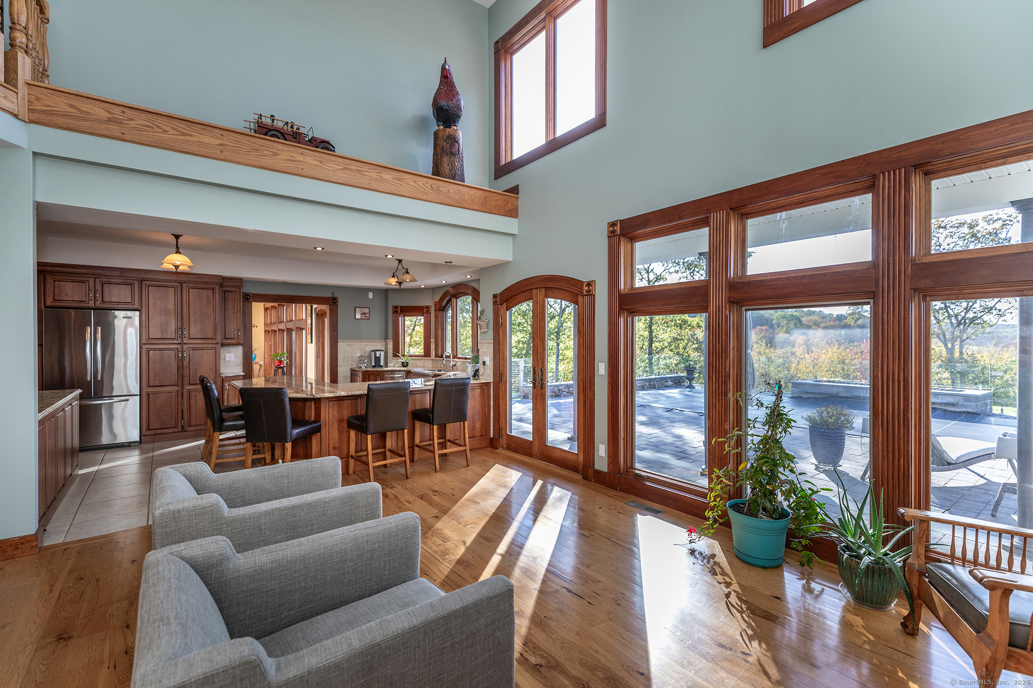8 Bobcat Lane Warren, CT 06754 - Photo 14 of 40 a living room with furniture and a large window