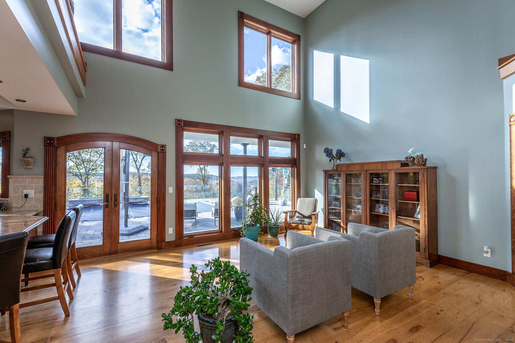 8 Bobcat Lane Warren, CT 06754 - Photo 15 of 40 a living room with furniture and a large window