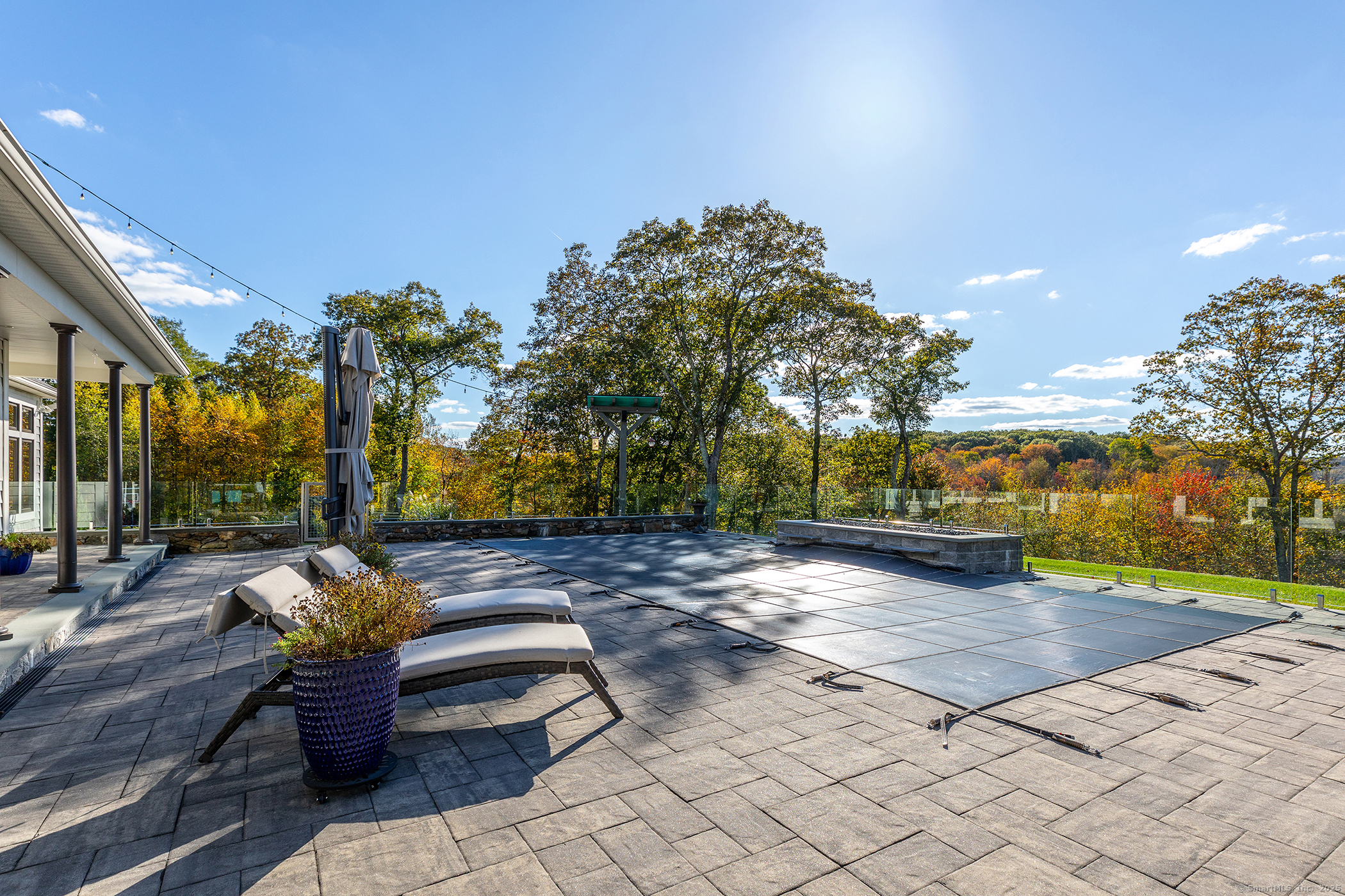 8 Bobcat Lane Warren, CT 06754 - Photo 18 of 40 a view of a patio with iron fence