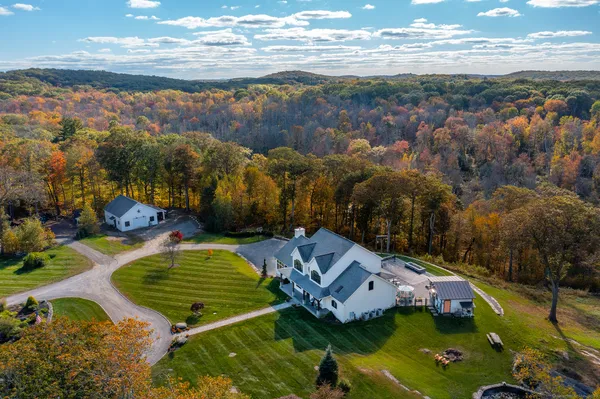 an aerial view of a house with a garden