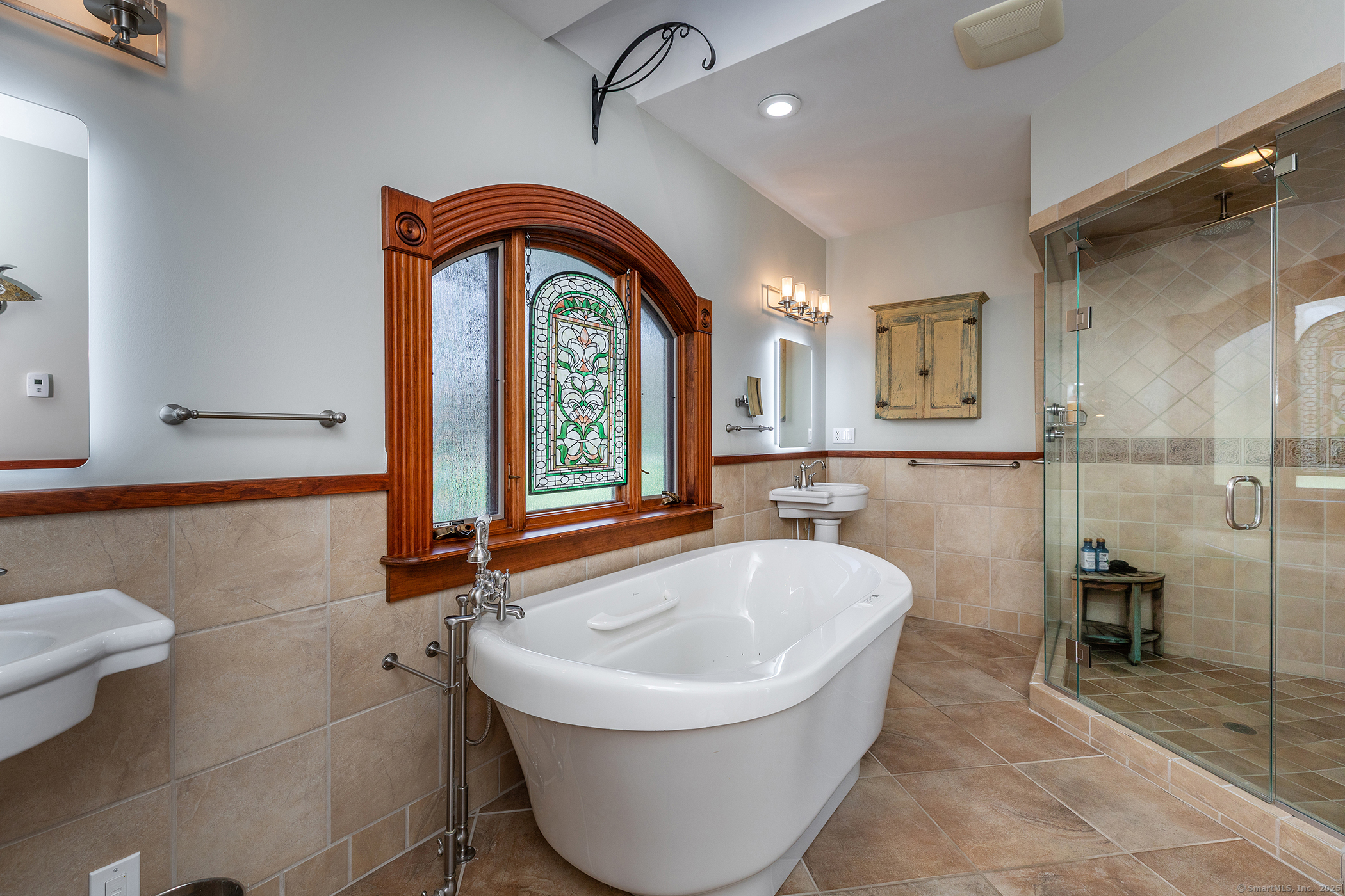 8 Bobcat Lane Warren, CT 06754 - Photo 31 of 40 a bathroom with a sink and a mirror