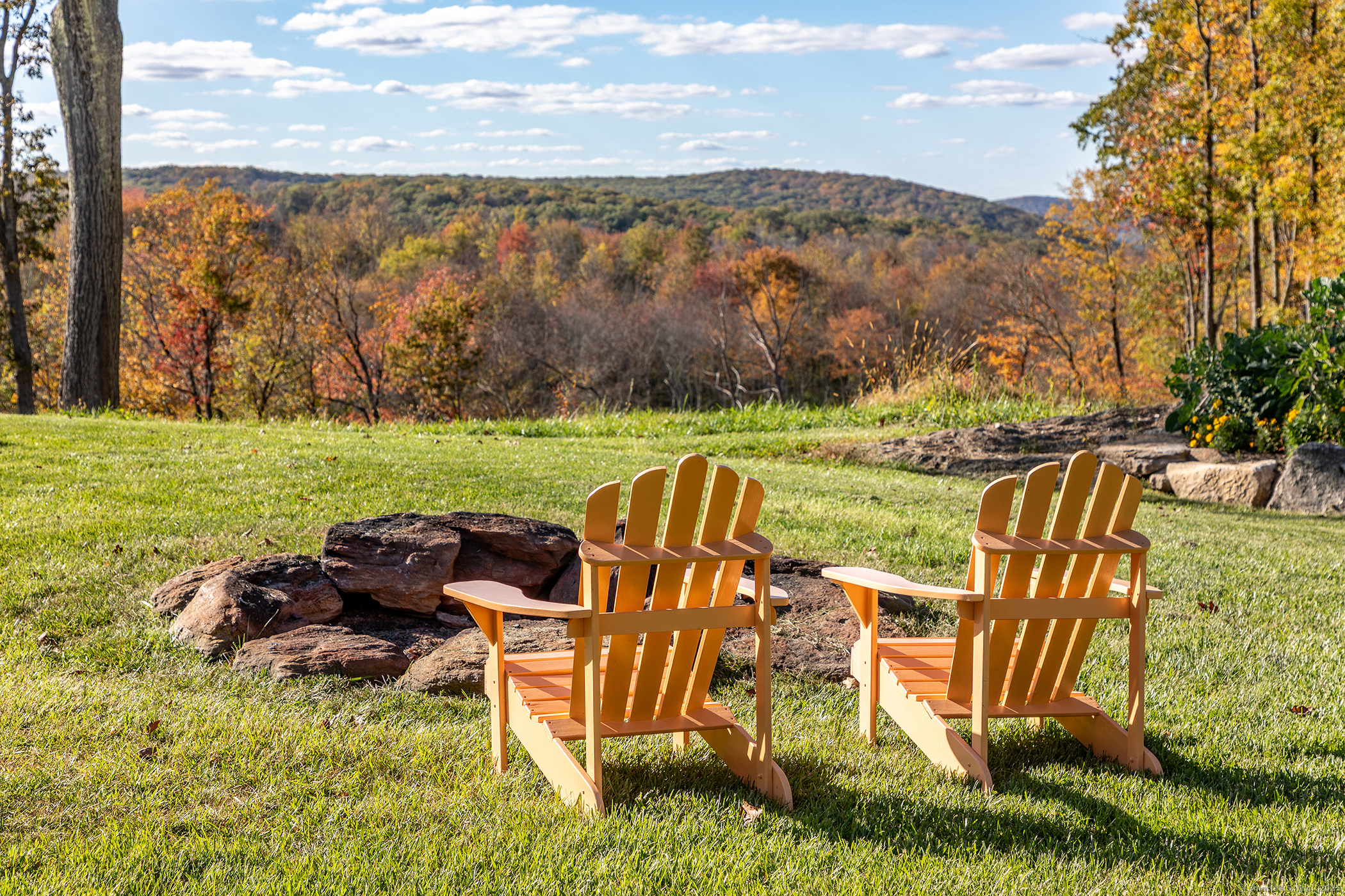 8 Bobcat Lane Warren, CT 06754 - Photo 38 of 40 a view of an chairs and table in the patio