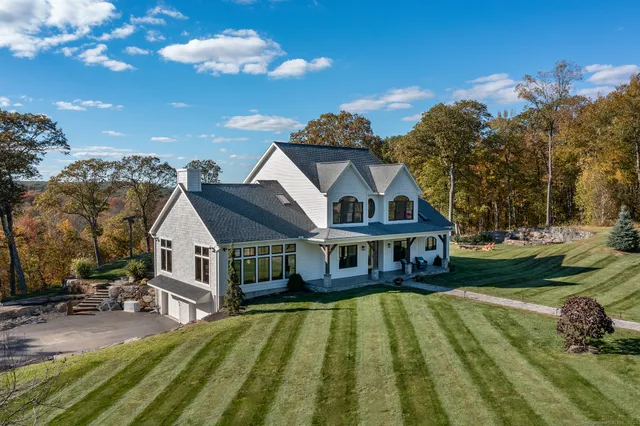 a view of a house with a swimming pool